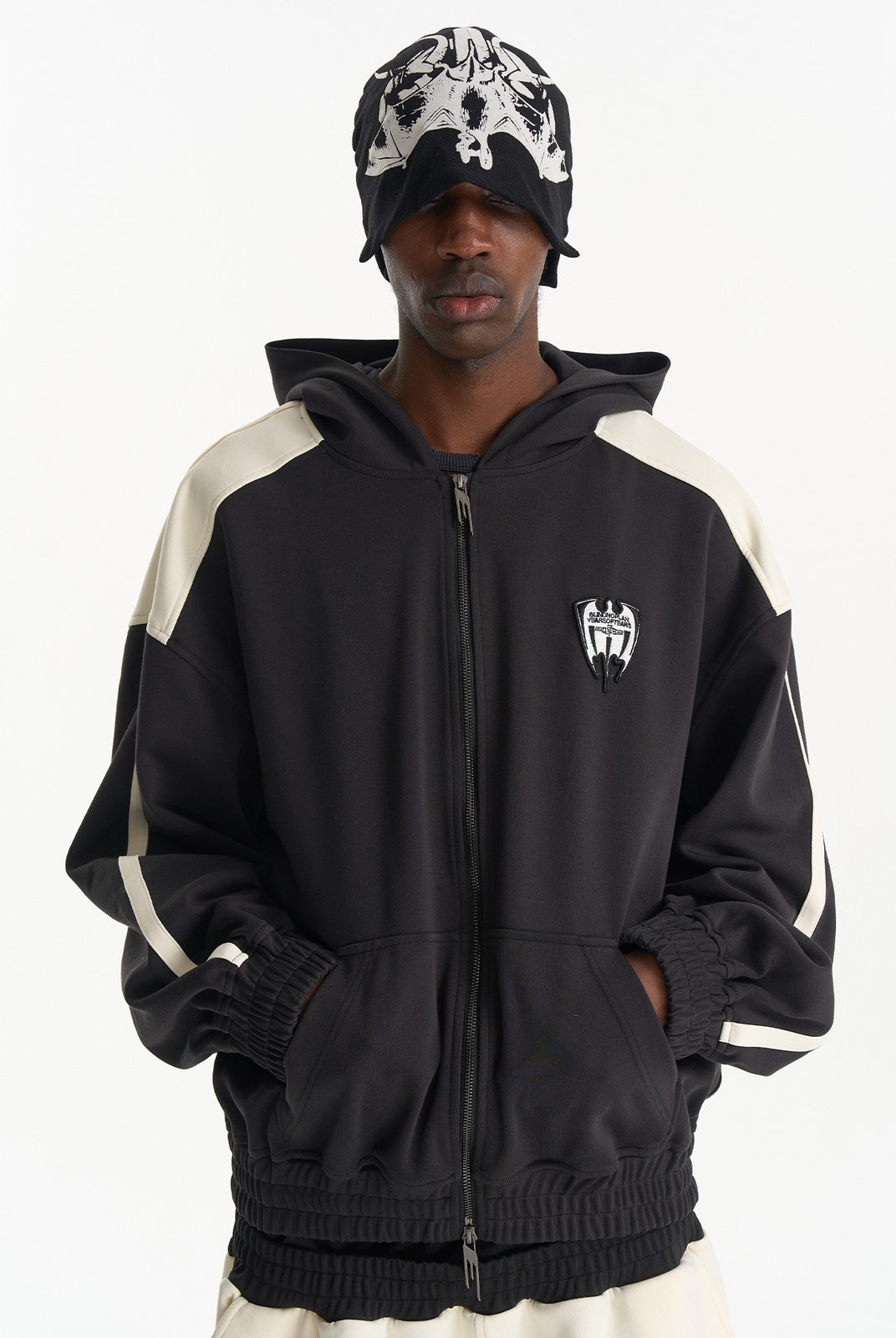 BLINDNOPLAN Hooded Colorblock Track Jacket in Black - On Male Model