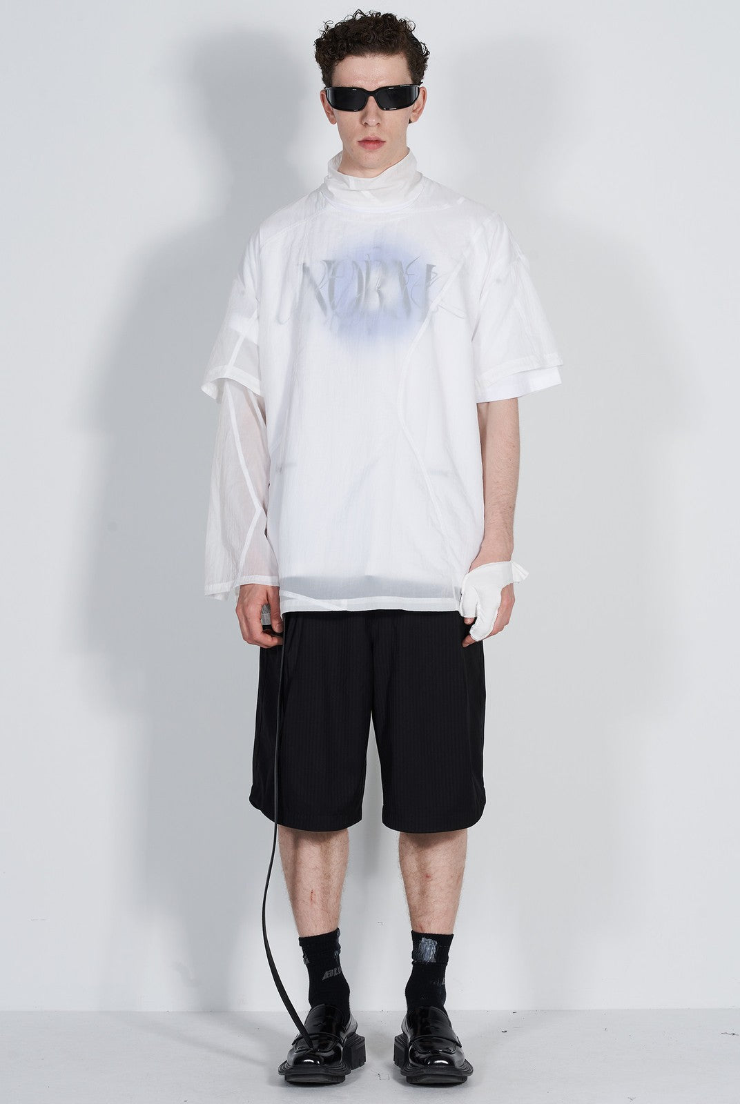 BLINDNOPLAN Asymmetric Striped Suit Shorts in Black - On Male Model