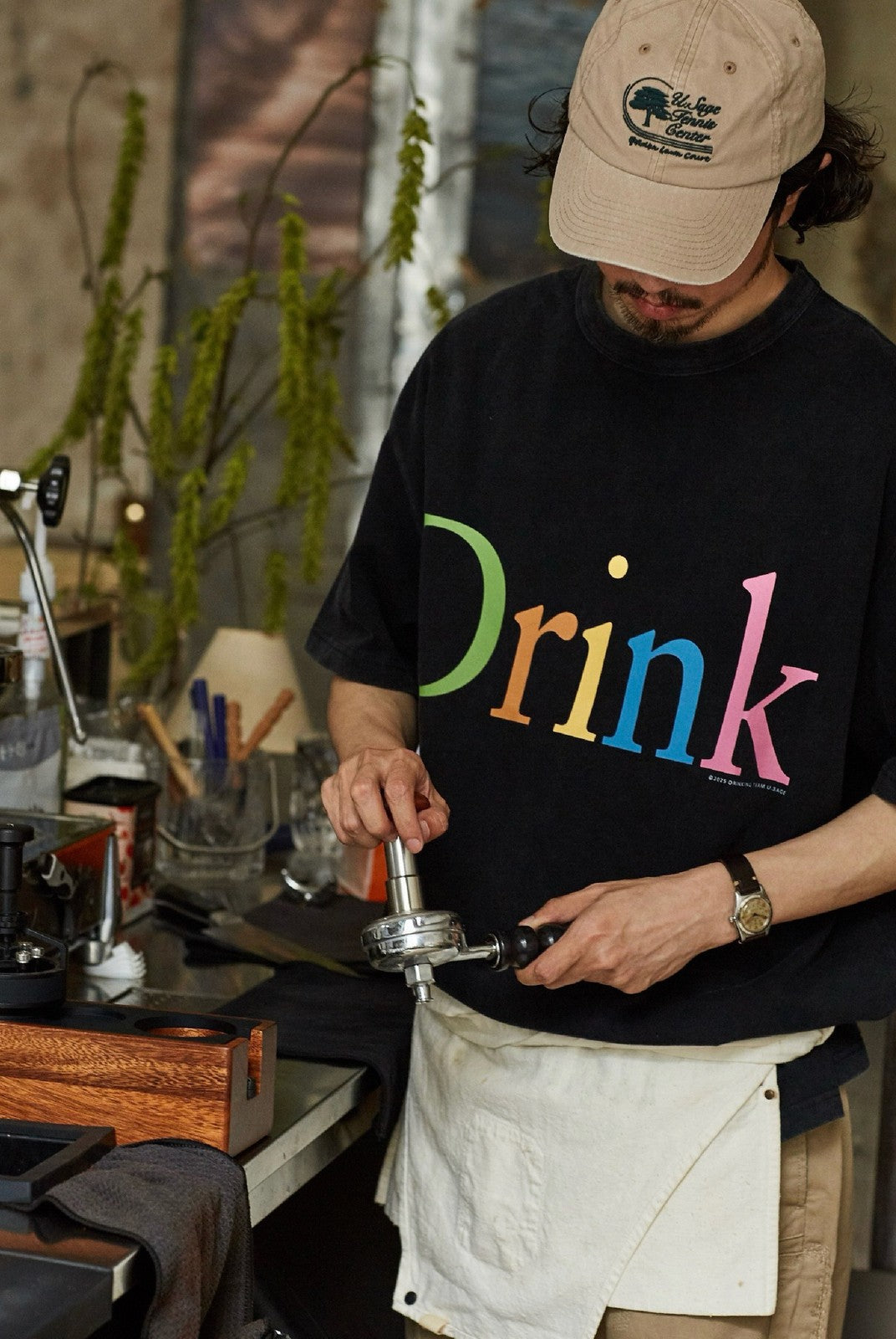USAGE Faded Rainbow Logo T Shirt in Black - On Male Model
