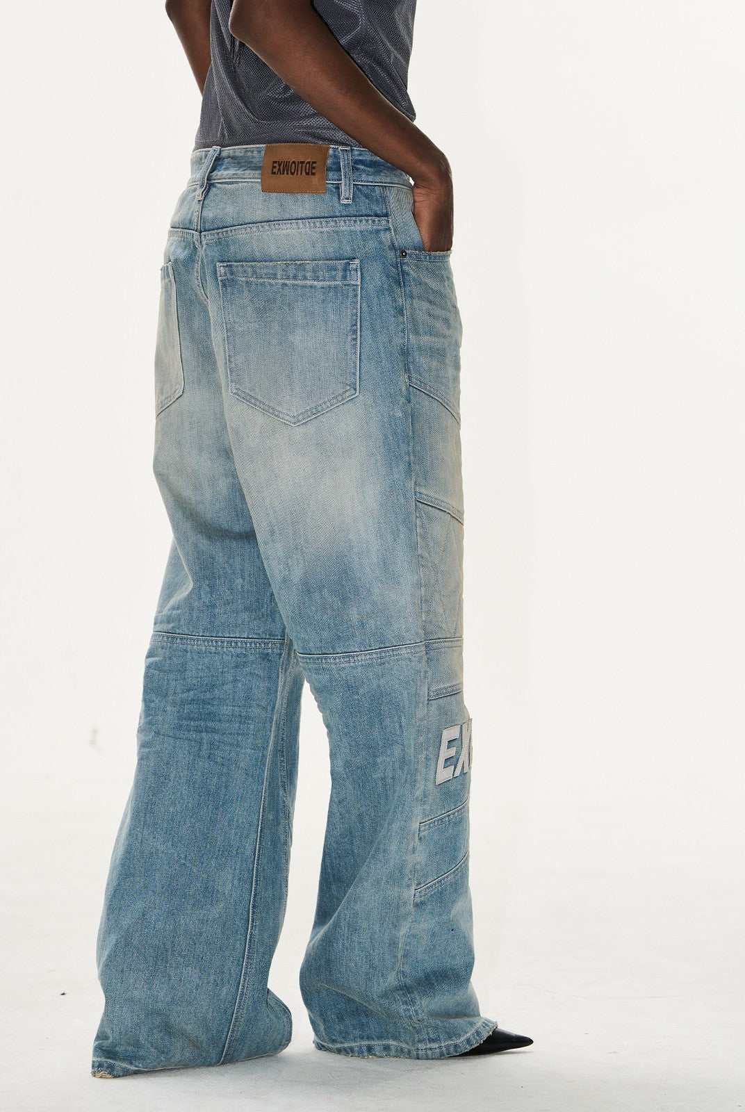 BLINDNOPLAN Paneled Embroidered Distressed Denim Pants in Blue - On Model