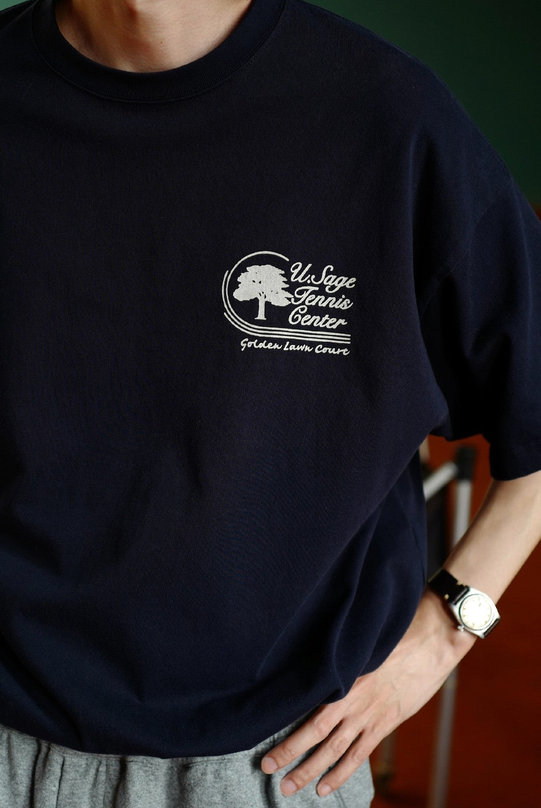 USAGE Retro Tennis Graphic Cotton T Shirt in Navy Blue - On Male Model