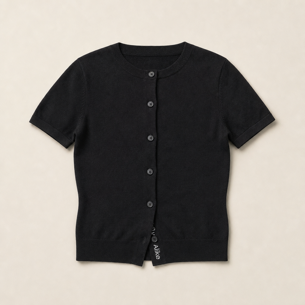 Mingstreet ASC launch still-life | RARELY ALIKE | Pure Wool Short Sleeve Cardigan | Black | generated_missing_still_life_expansion