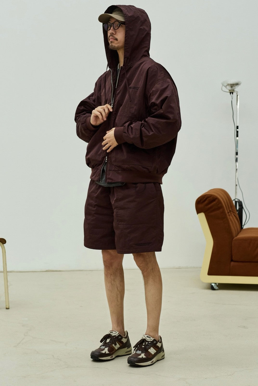 USAGE Crinkle Nylon Hooded Track Jacket in Brown - On Male Model