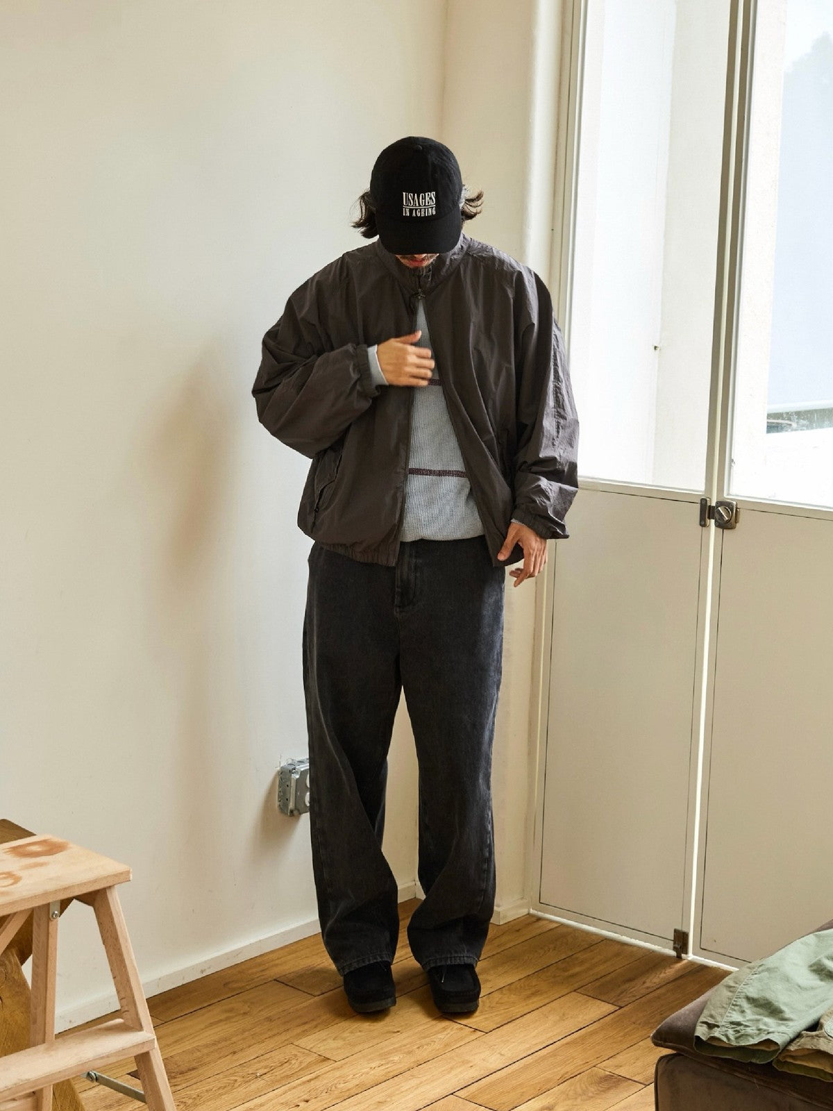 USAGE Lightweight Nylon Zip Up Jacket in Gray - On Male Model