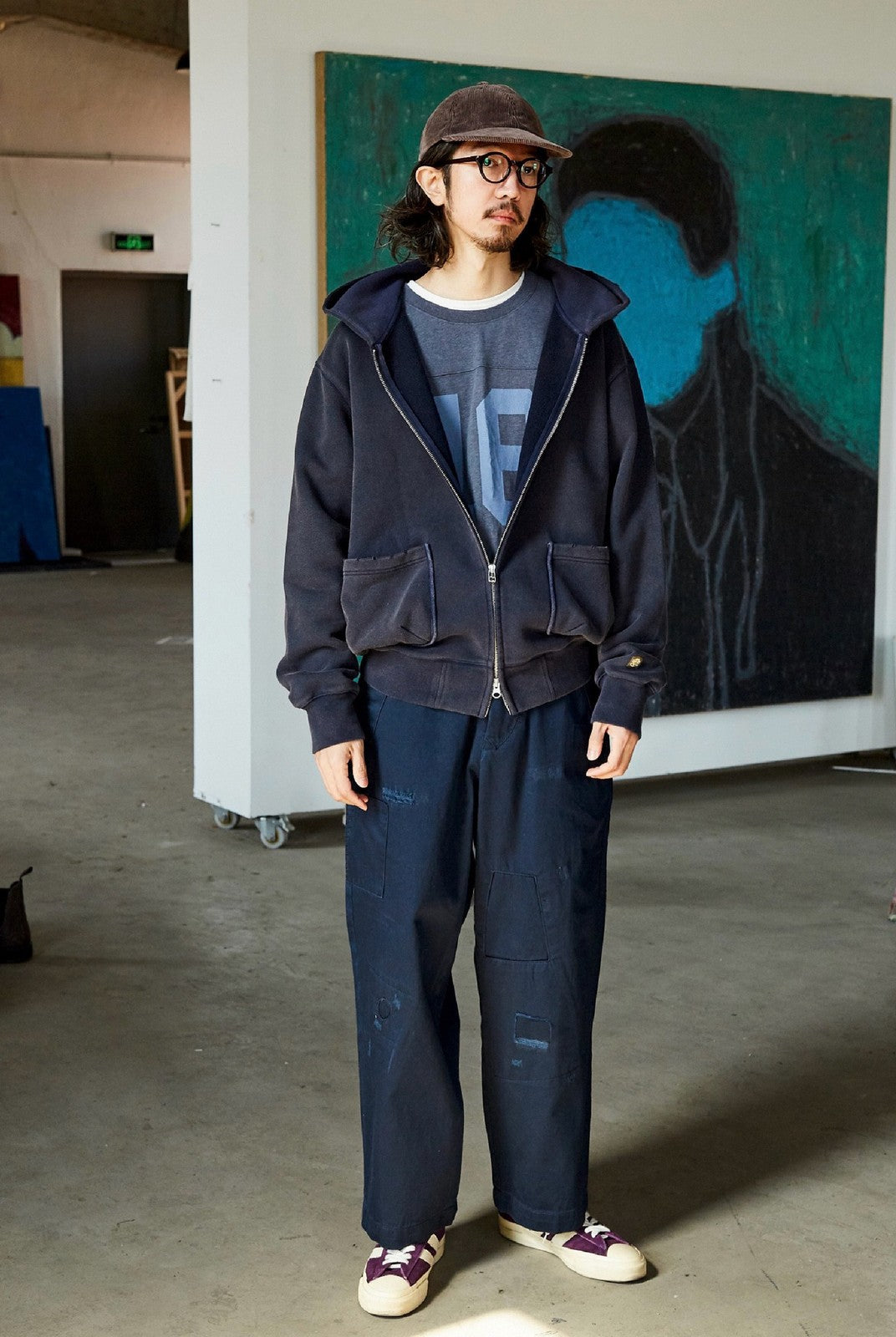 USAGE Hand Distressed Washed Zip Hoodie in Navy Blue - On Male Model