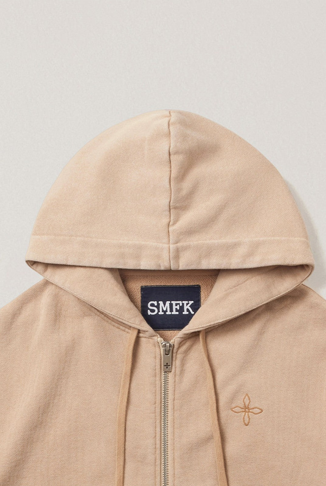 SMFK Cross Embroidered Cotton Zip Up Hoodie in Beige - Detail