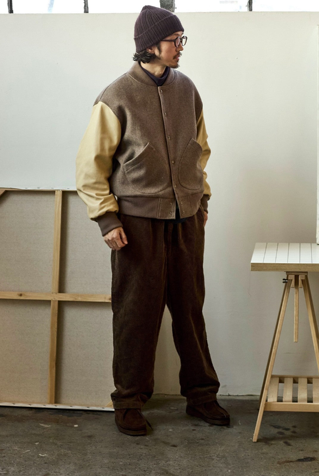 USAGE Reversible Velvet Leather Varsity Jacket in Beige - On Male Model