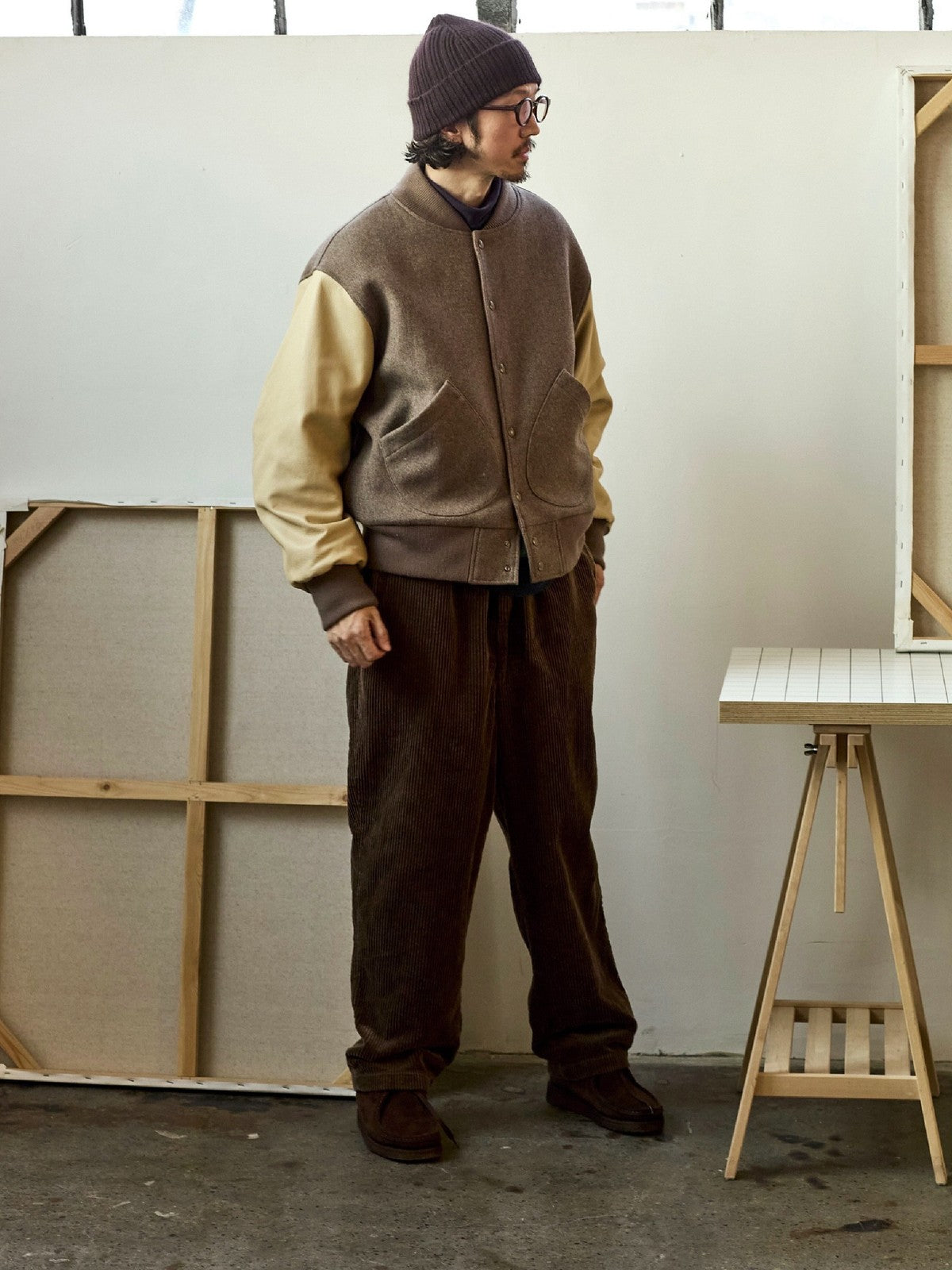 USAGE Reversible Velvet Leather Varsity Jacket in Beige - On Male Model