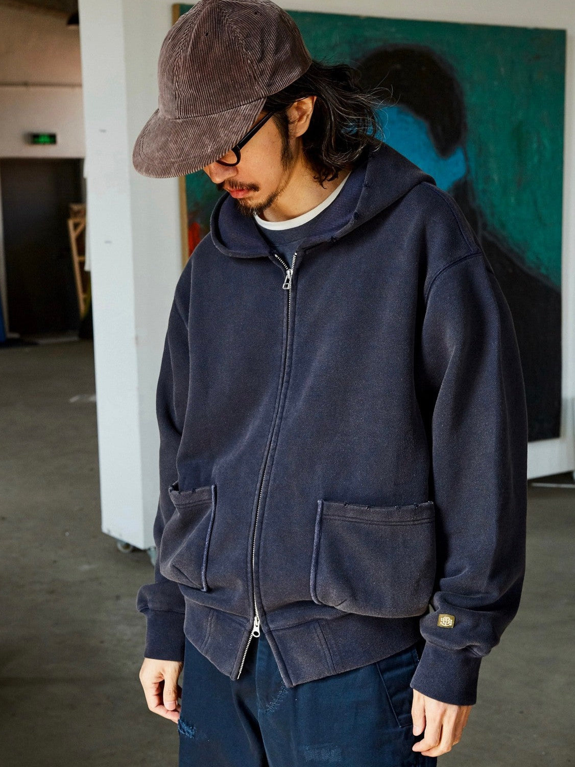 USAGE Hand Distressed Washed Zip Hoodie in Navy Blue - On Male Model
