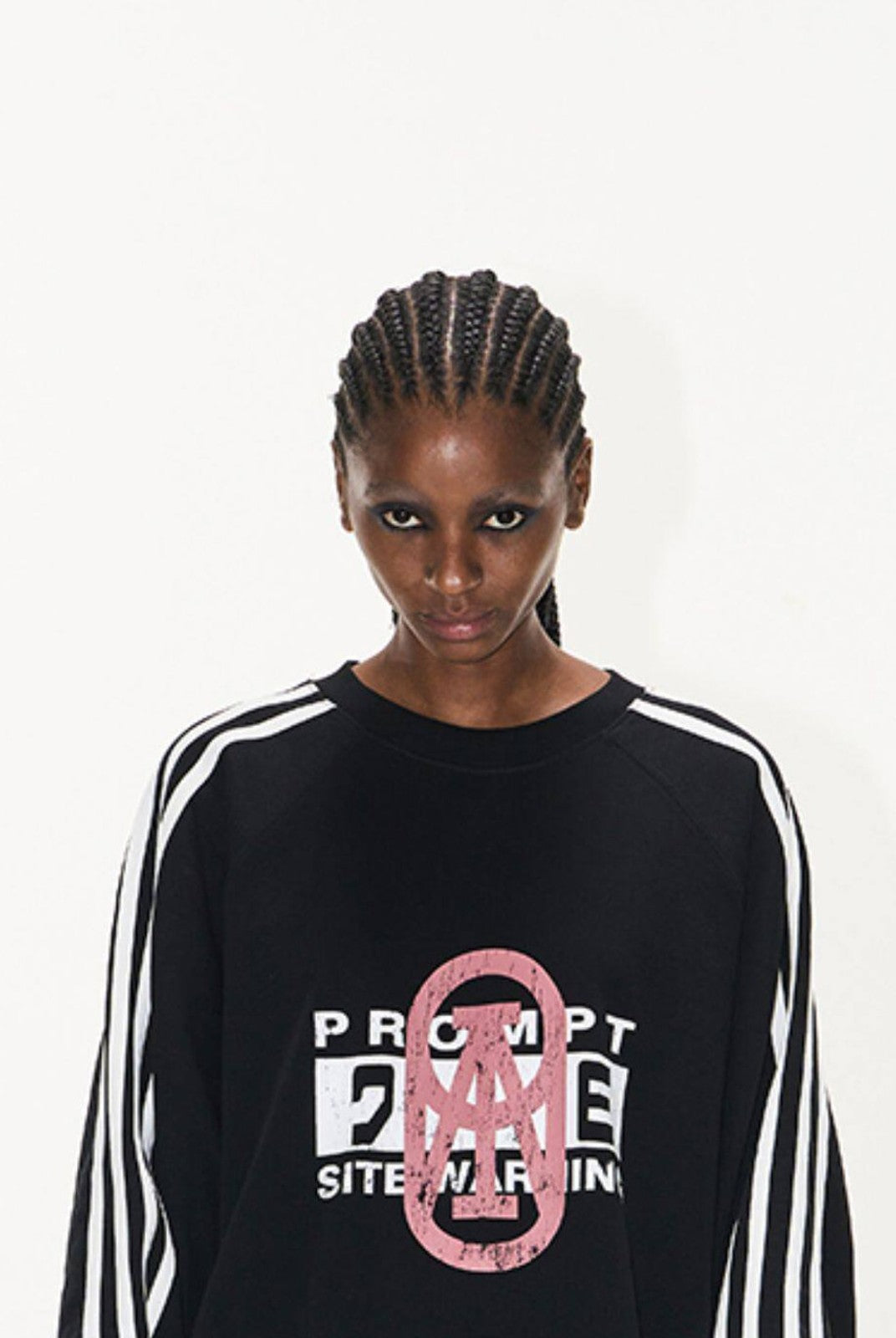 BLINDNOPLAN Color Block Graphic Raglan Sweatshirt in Black - On Female Model