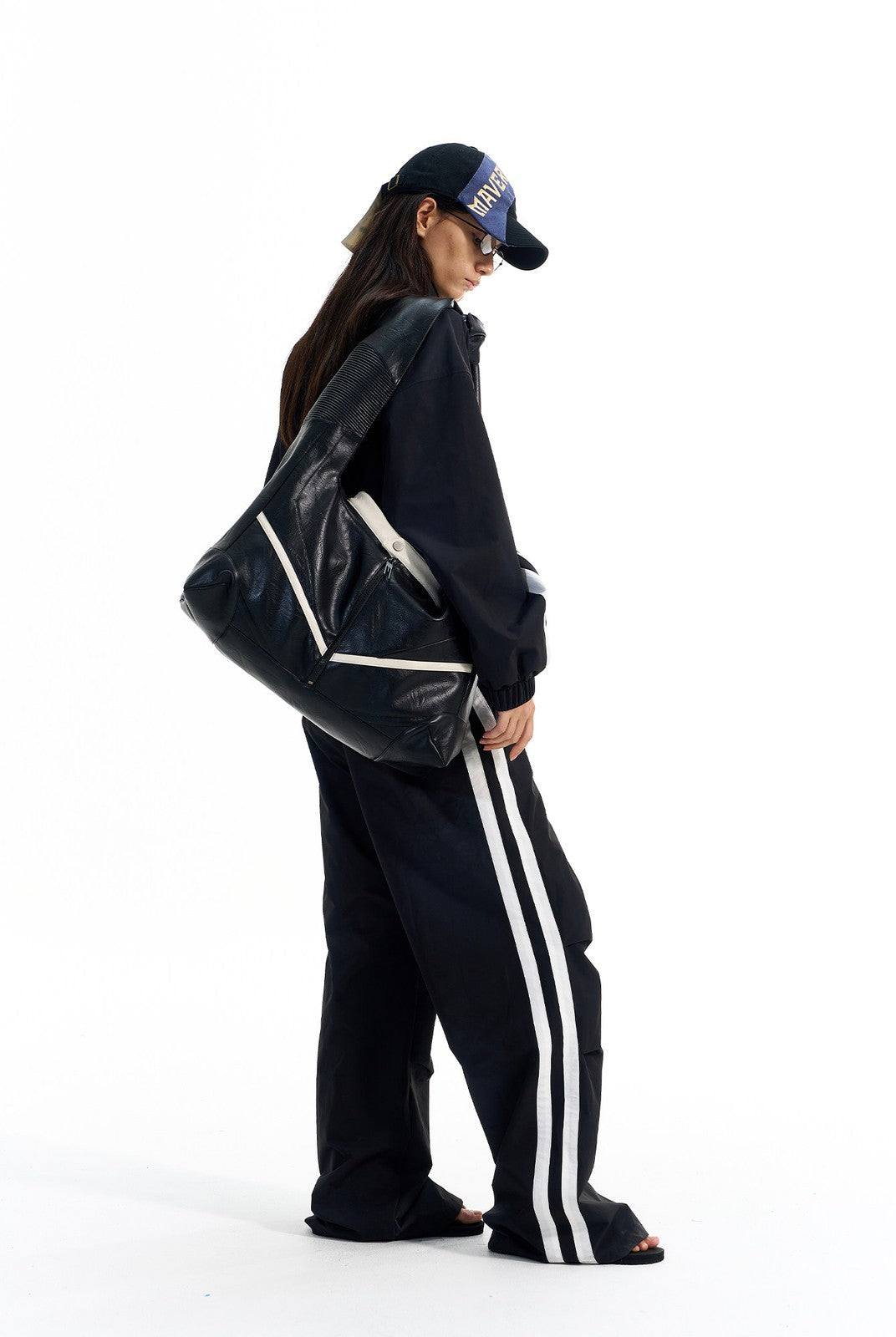 BLINDNOPLAN Striped Pleated Track Pants in Black - On Female Model