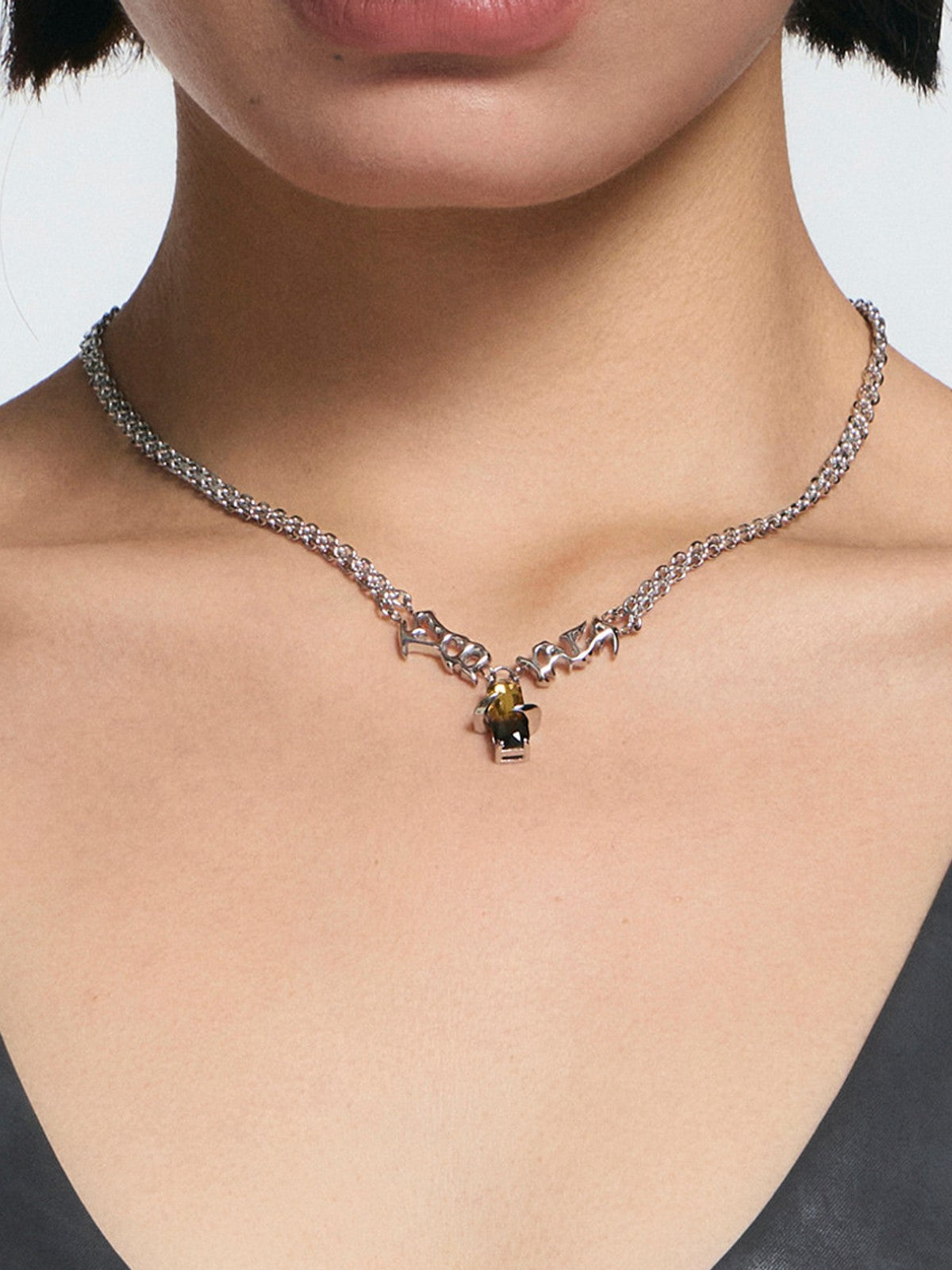 BLACKHEAD Vinyl Wave Gradient Necklace in Silver - On Female Model