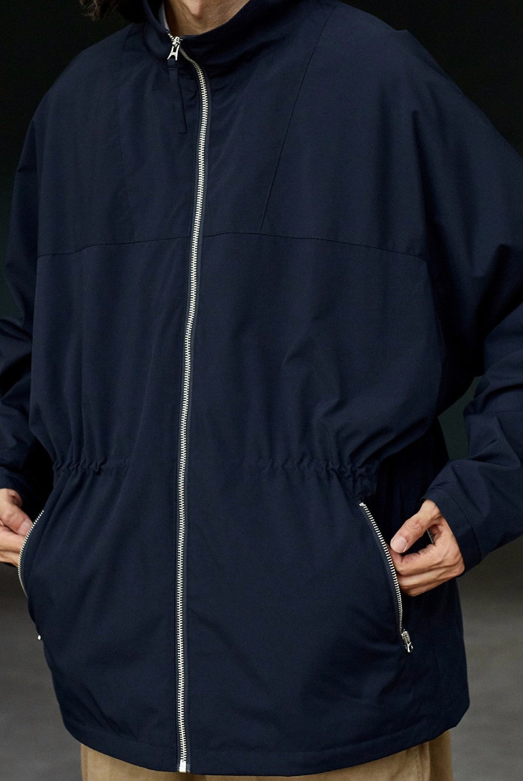 USAGE Drawstring Zip Front Tech Anorak in Navy Blue - On Male Model