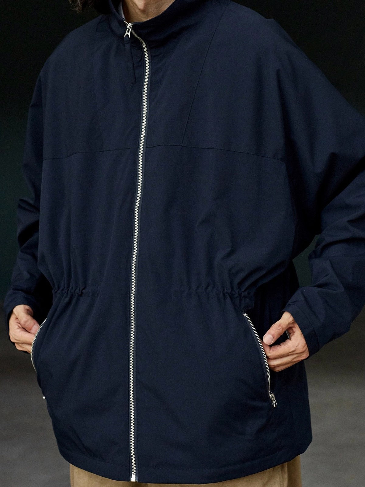 USAGE Drawstring Zip Front Tech Anorak in Navy Blue - On Male Model