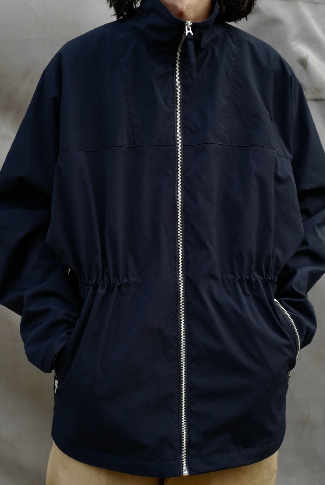 USAGE Drawstring Zip Front Tech Anorak in Navy Blue - On Model