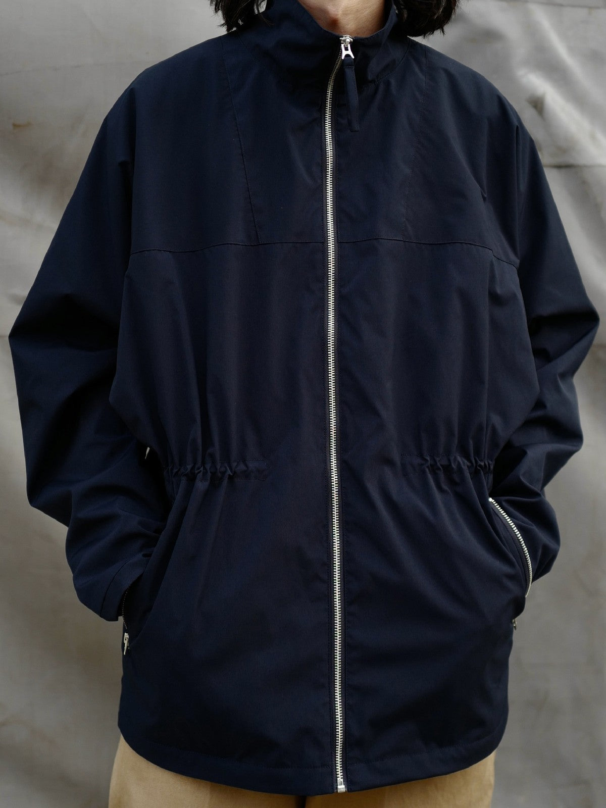USAGE Drawstring Zip Front Tech Anorak in Navy Blue - On Model