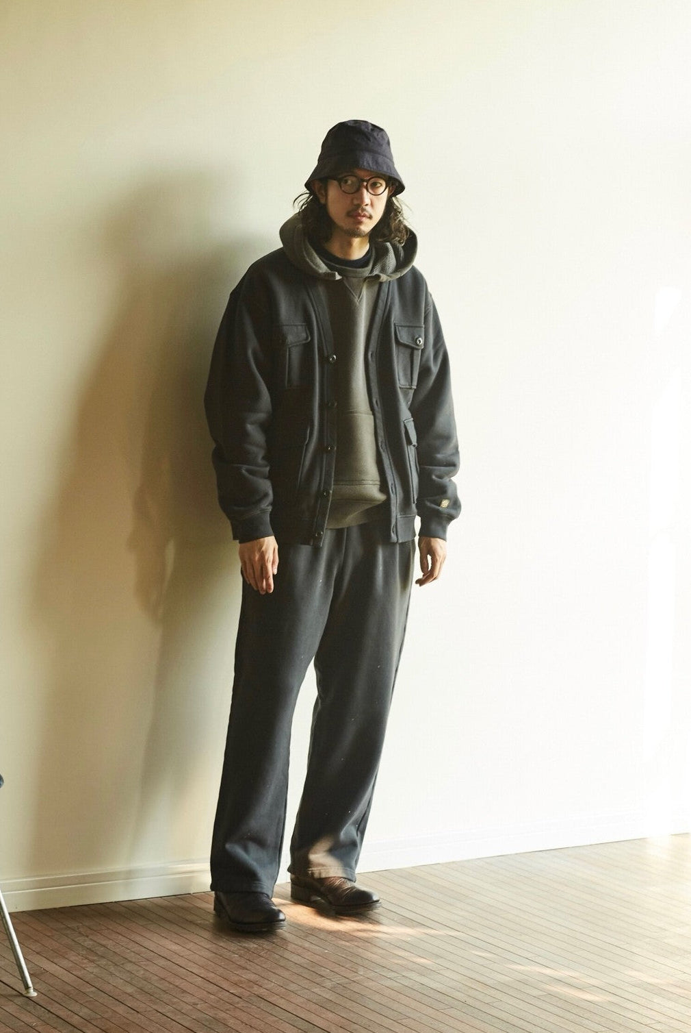 USAGE Cotton Safari Pocket Cardigan Sweatshirt in Navy Blue - On Male Model