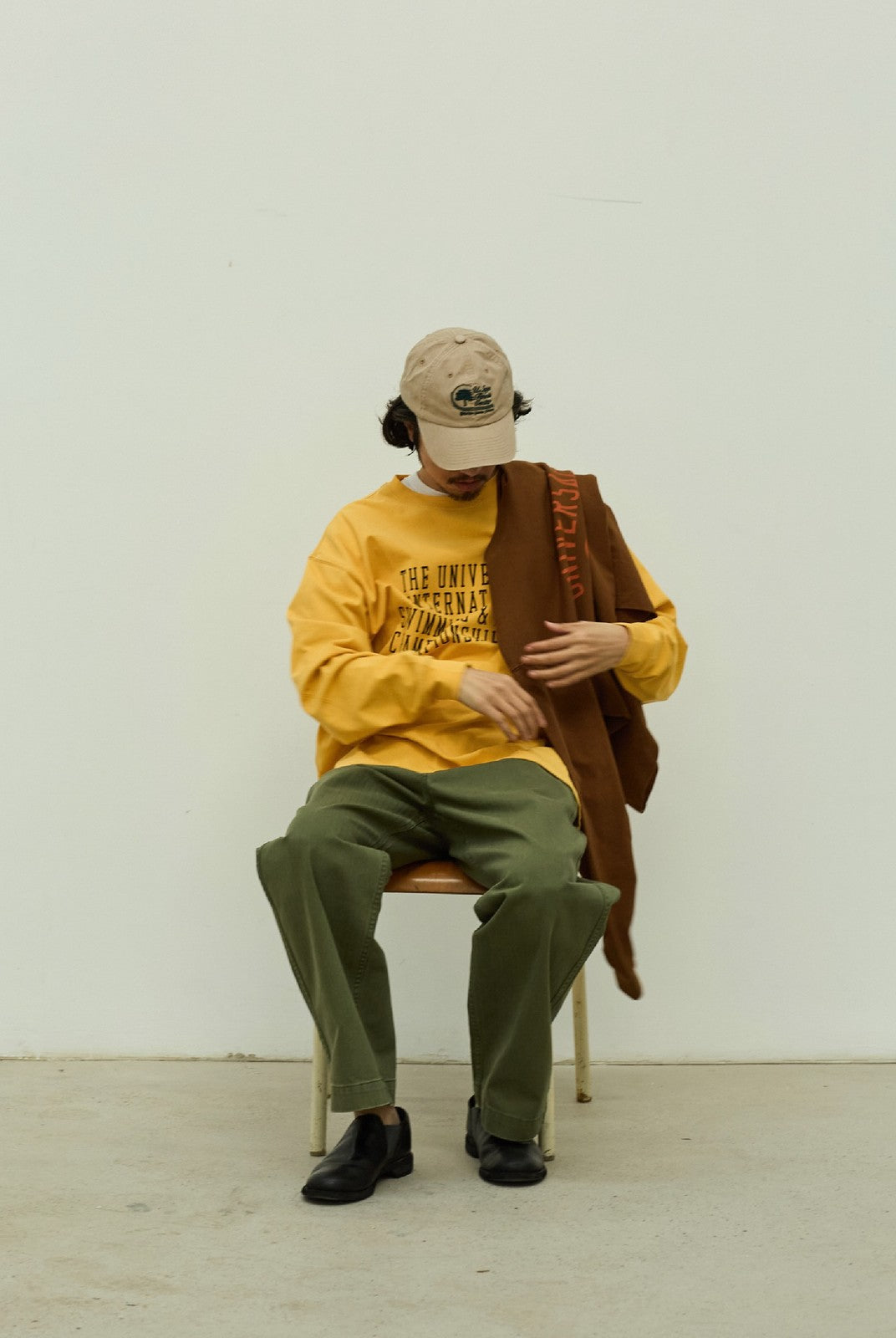USAGE Heavyweight Herringbone Twill Belted Trousers in Olive - On Male Model