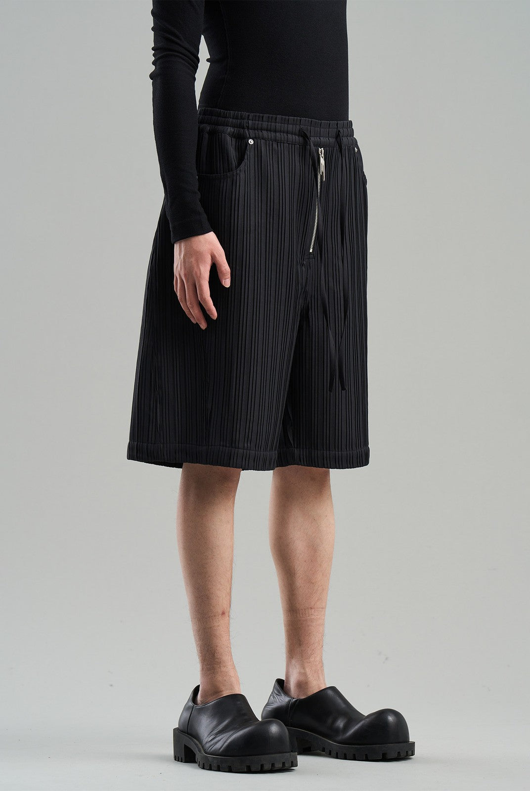 BLINDNOPLAN Textured Rivet Suit Shorts in Black - On Male Model