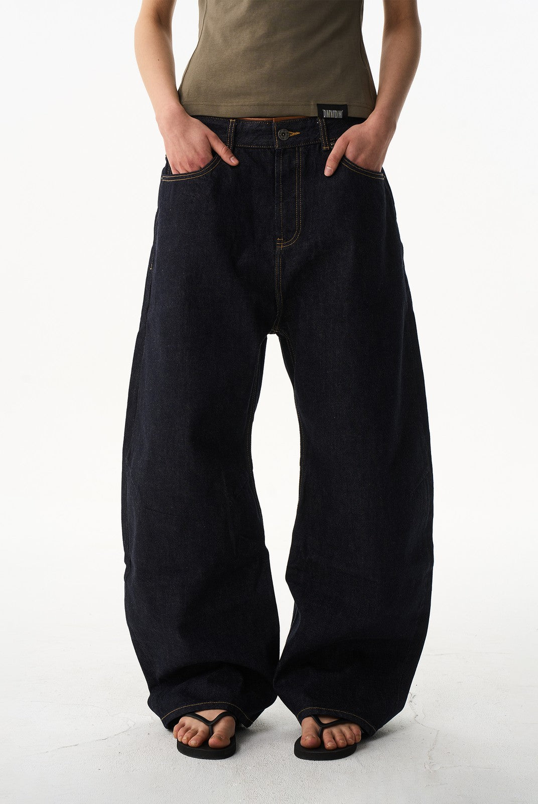 BLINDNOPLAN Curved Wide Leg Raw Denim Jeans in Denim - On Model