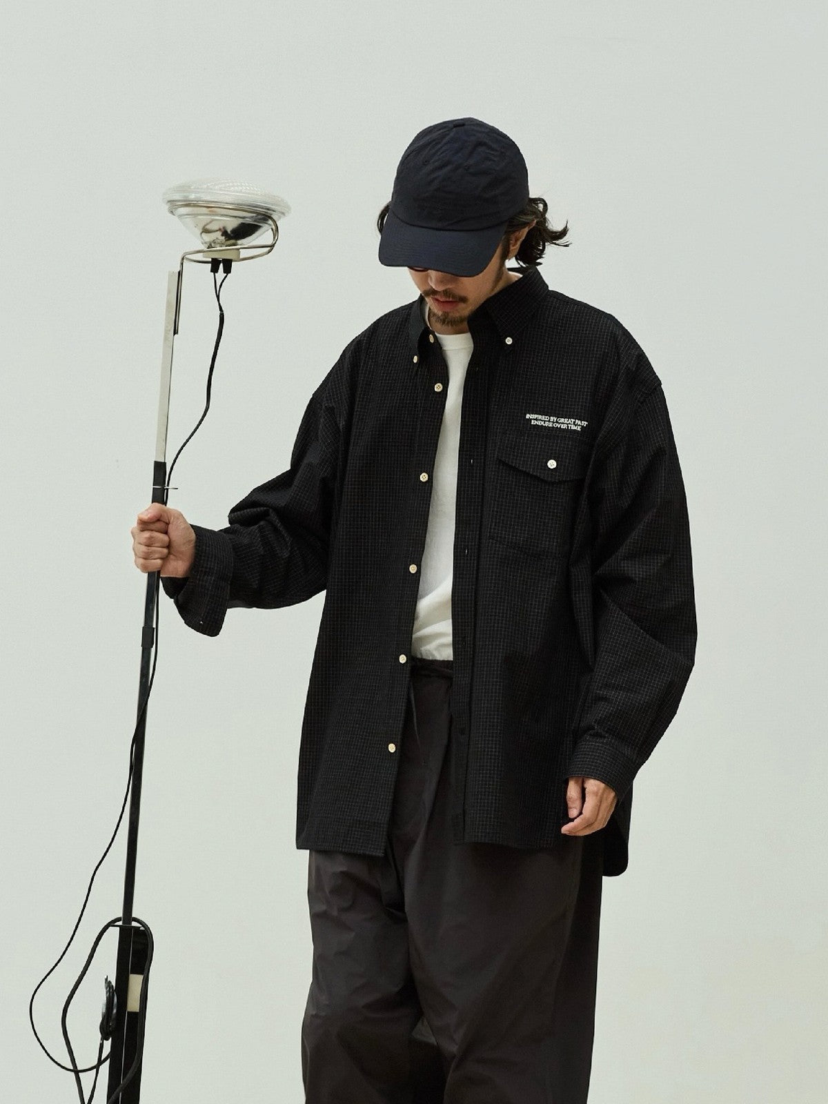 USAGE Oversized Micro Check Button Down Shirt in Black - On Male Model