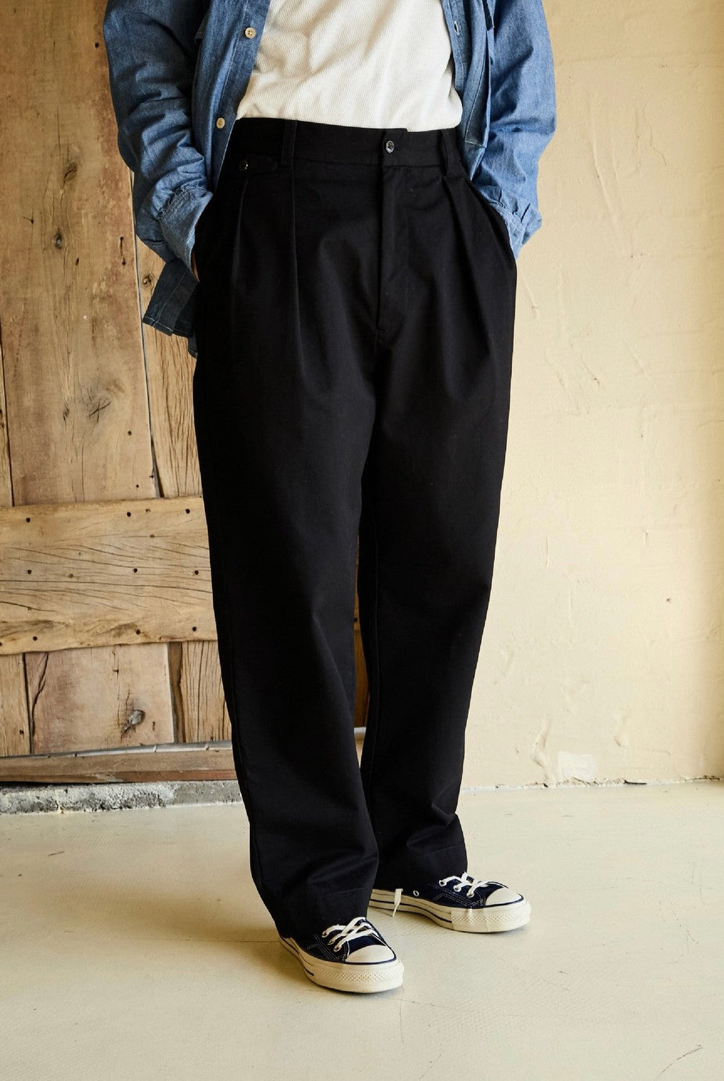 USAGE Pleated Cotton Twill Chinos in Black - On Model