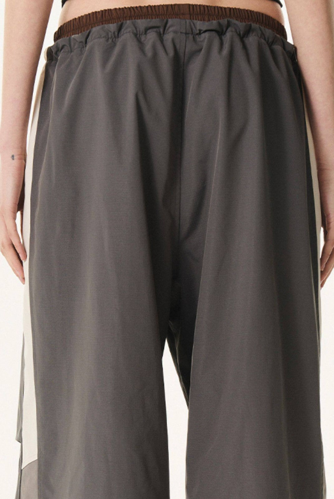 BLINDNOPLAN Contrast Panel Pleated Parachute Pants in Gray - On Model
