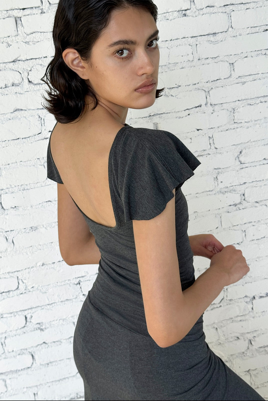 FaxCopyExpress Flutter Sleeve Open Back Top in Gray - On Female Model