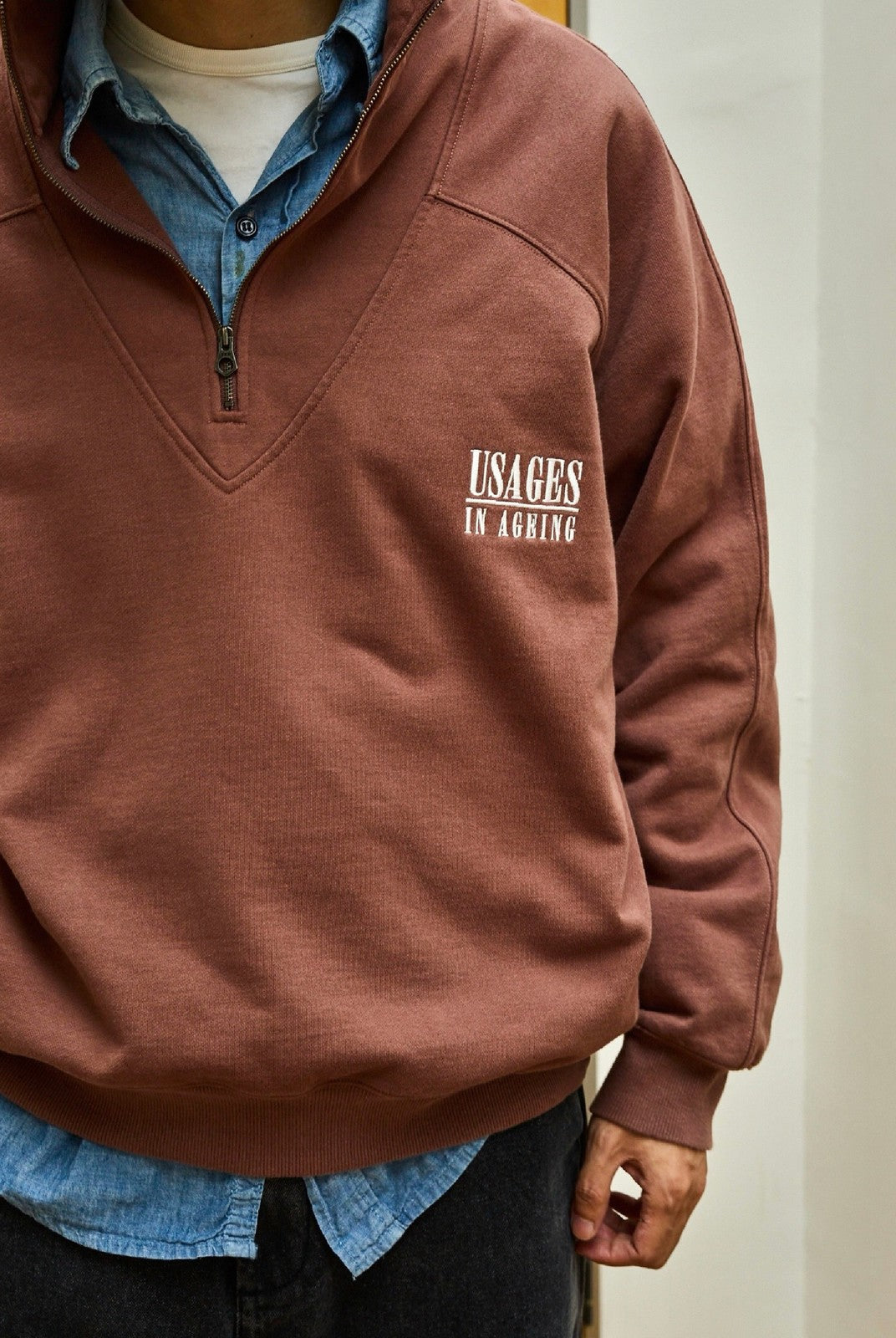 USAGE Heavyweight Cotton Half Zip Sweatshirt in Brown - On Male Model