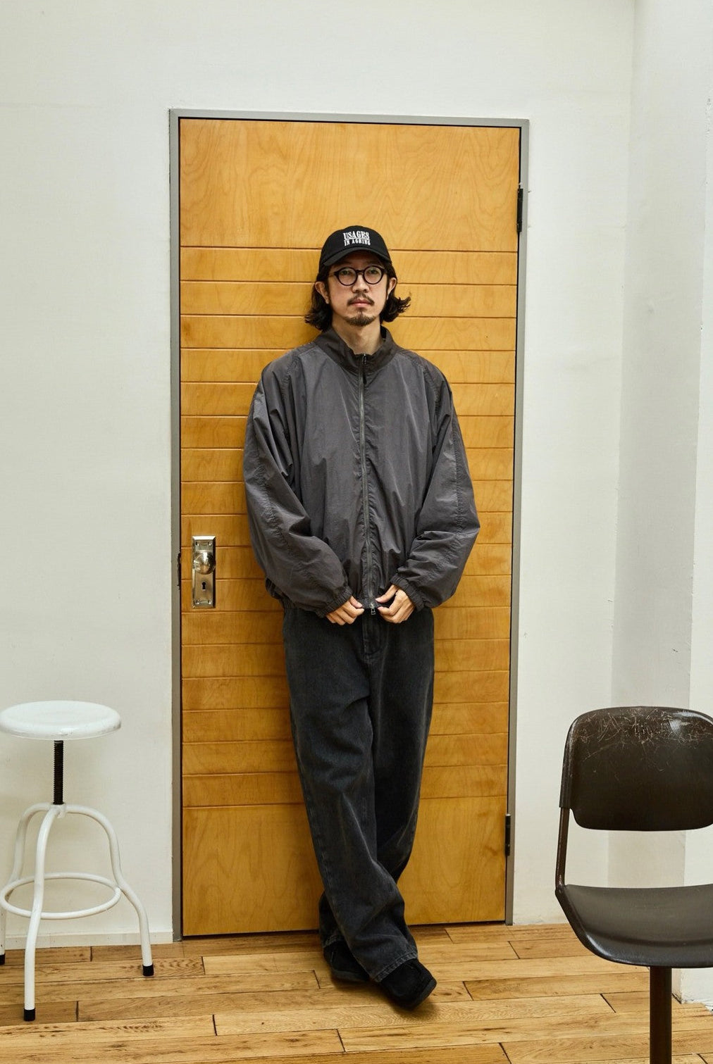 USAGE Lightweight Nylon Zip Up Jacket in Gray - On Male Model