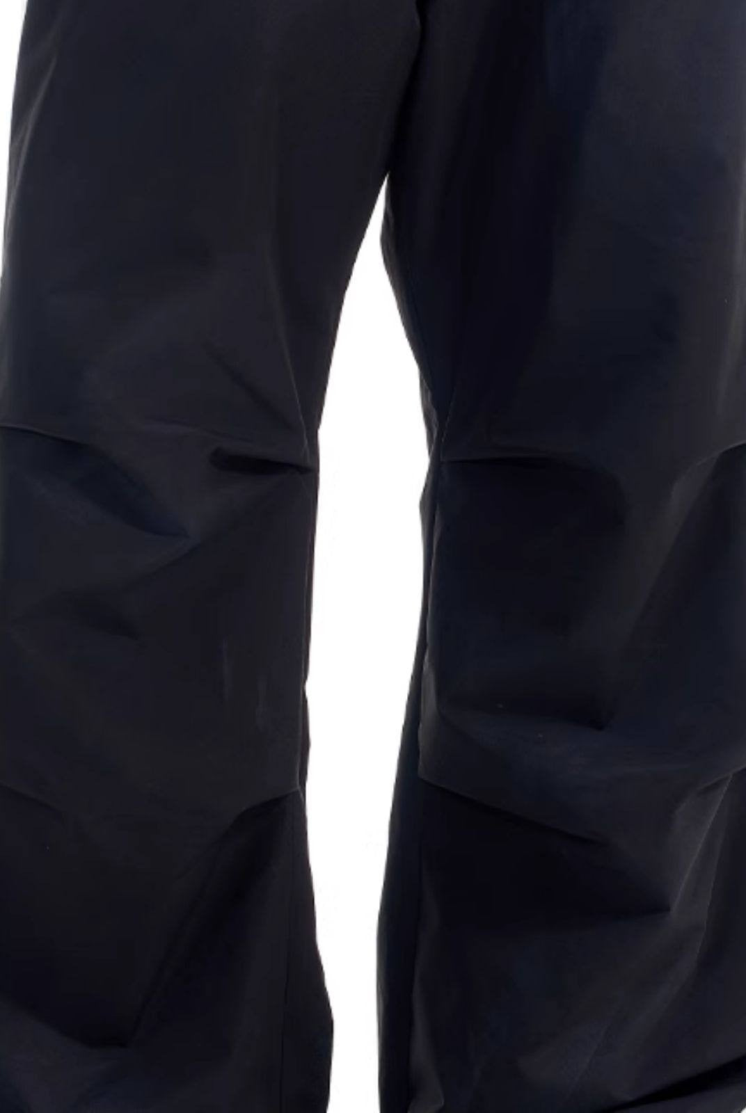 BLINDNOPLAN Striped Pleated Track Pants in Black - On Female Model