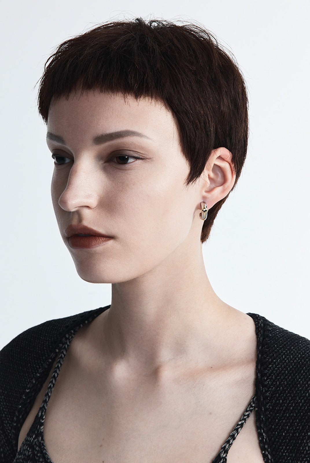 BLACKHEAD Two Tone Starburst Hoop Earrings in Gold - On Female Model