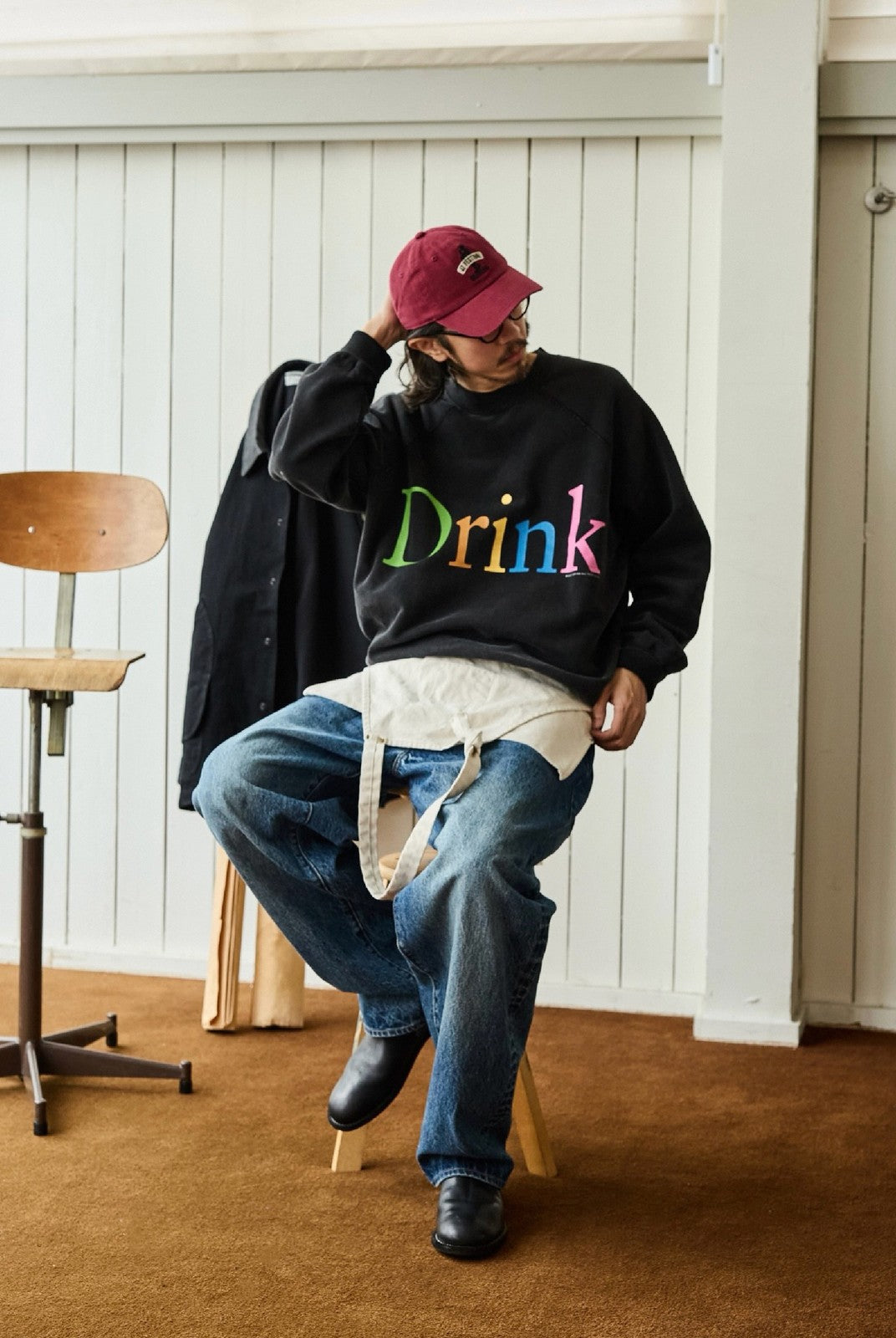 USAGE Washed Cotton Graphic Sweatshirt in Black - On Male Model