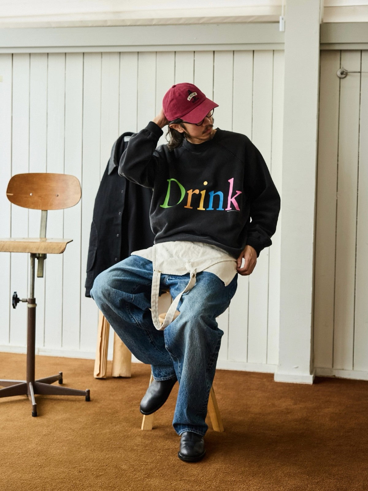 USAGE Washed Cotton Graphic Sweatshirt in Black - On Male Model