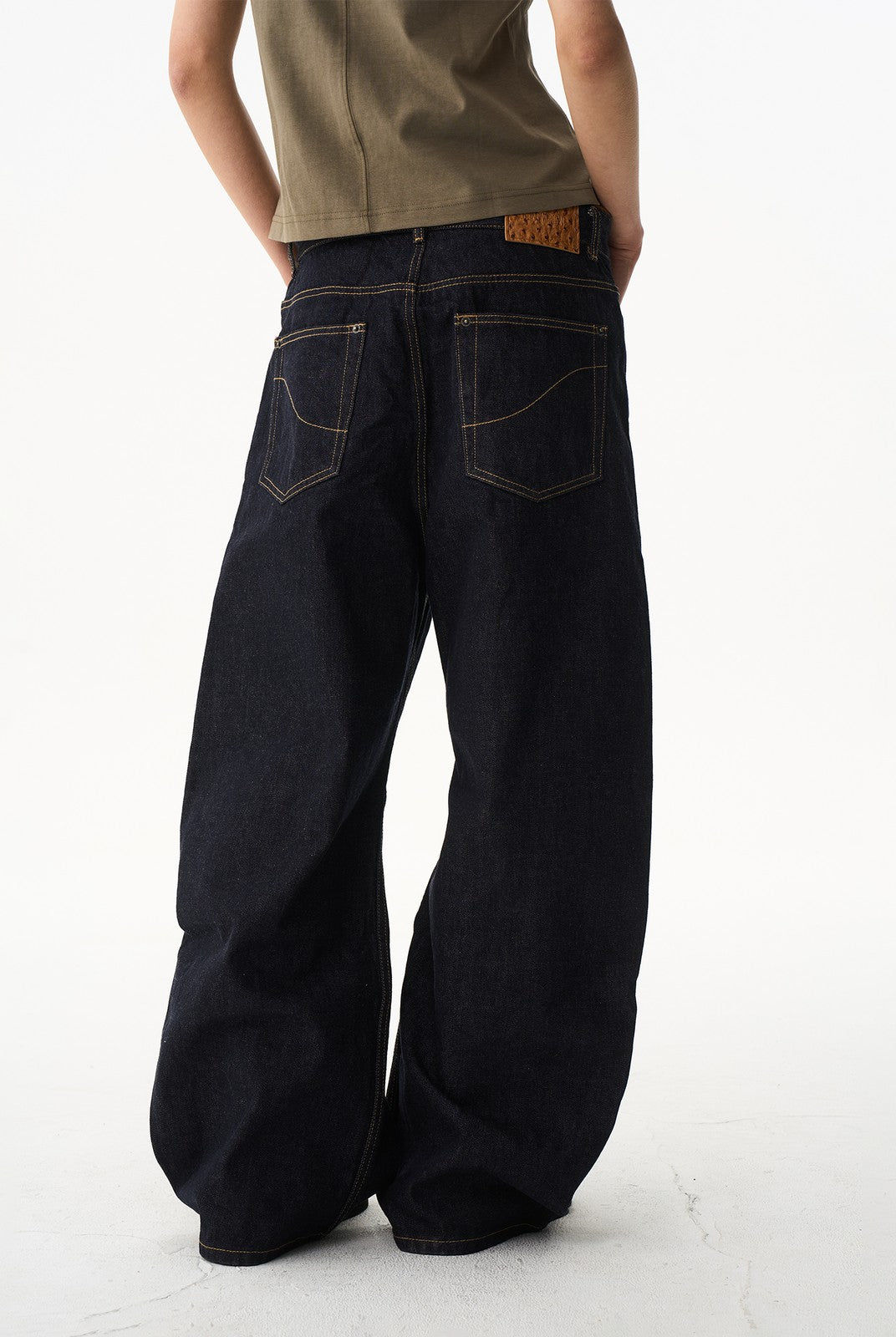 BLINDNOPLAN Curved Wide Leg Raw Denim Jeans in Denim - On Model