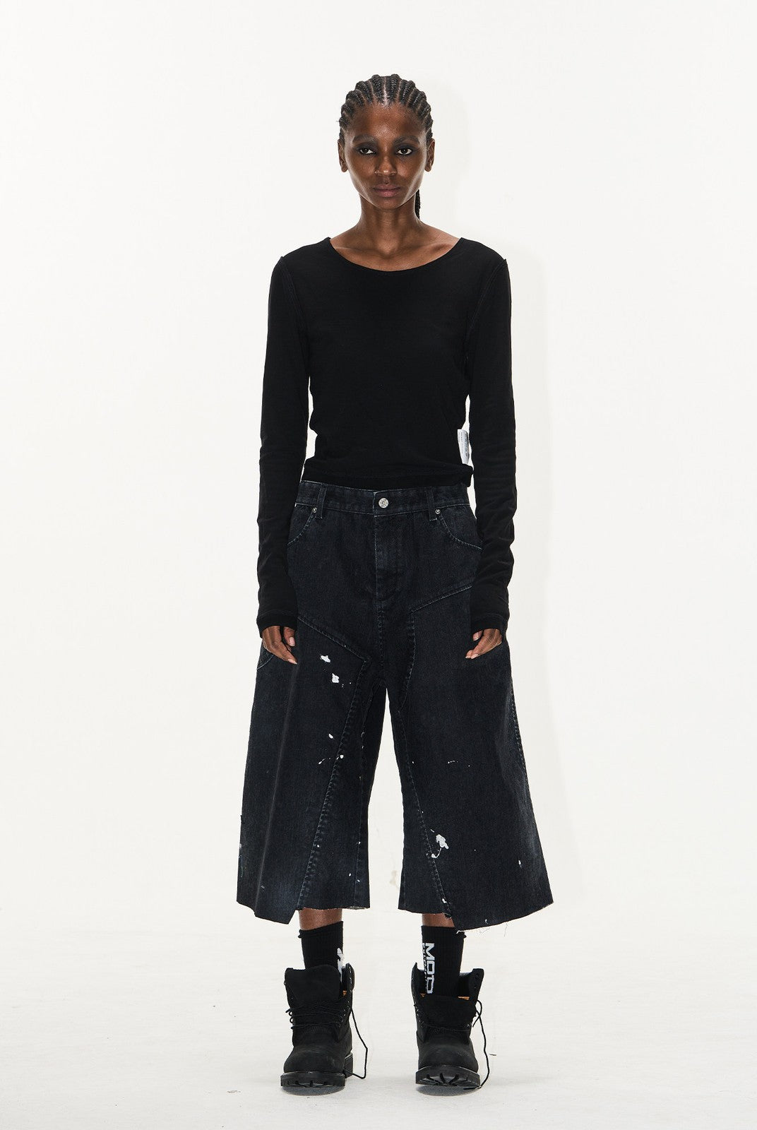 BLINDNOPLAN Ink Splatter Denim Carpenter Shorts in Black - On Female Model