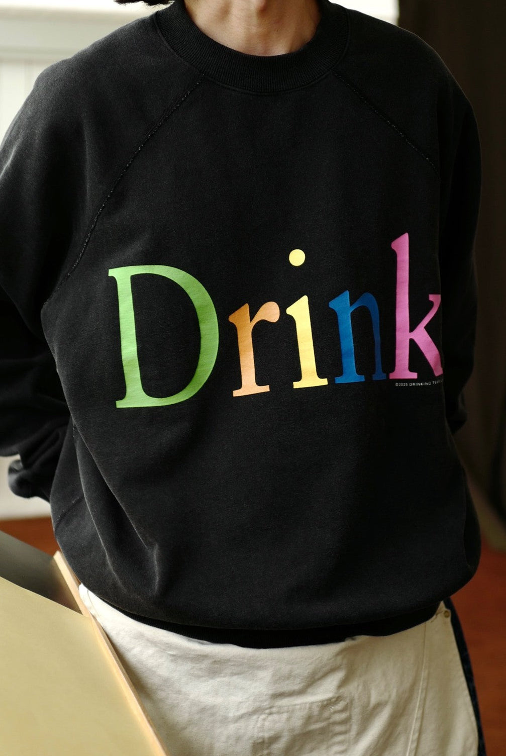 USAGE Washed Cotton Graphic Sweatshirt in Black - On Male Model