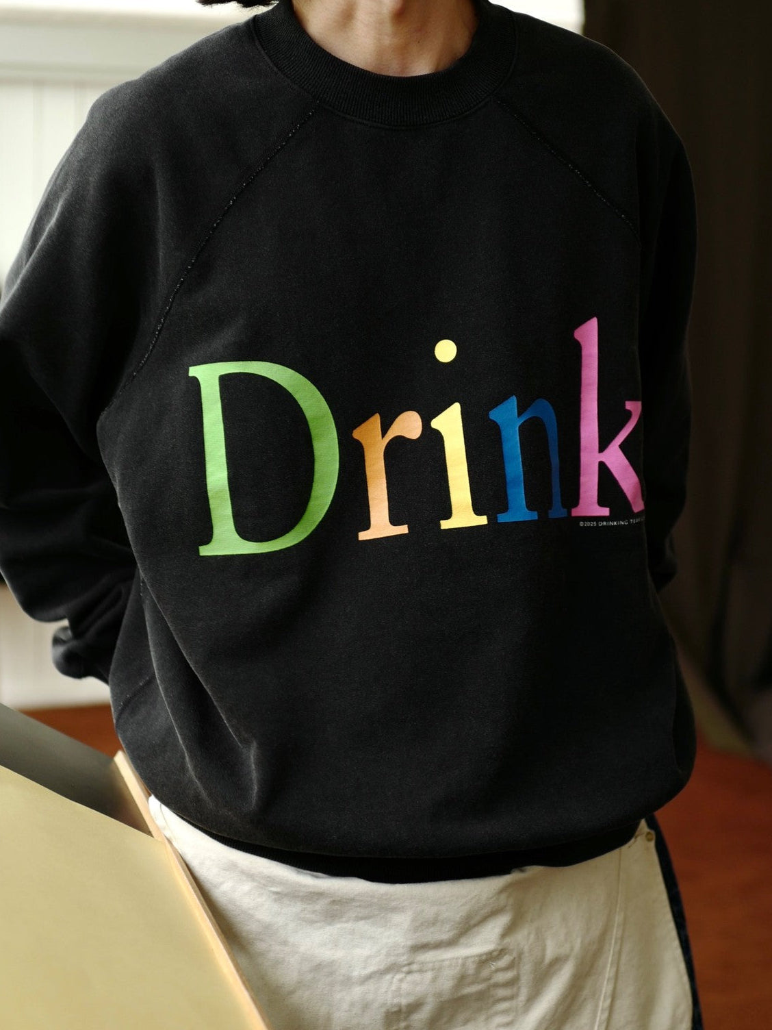 USAGE Washed Cotton Graphic Sweatshirt in Black - On Male Model