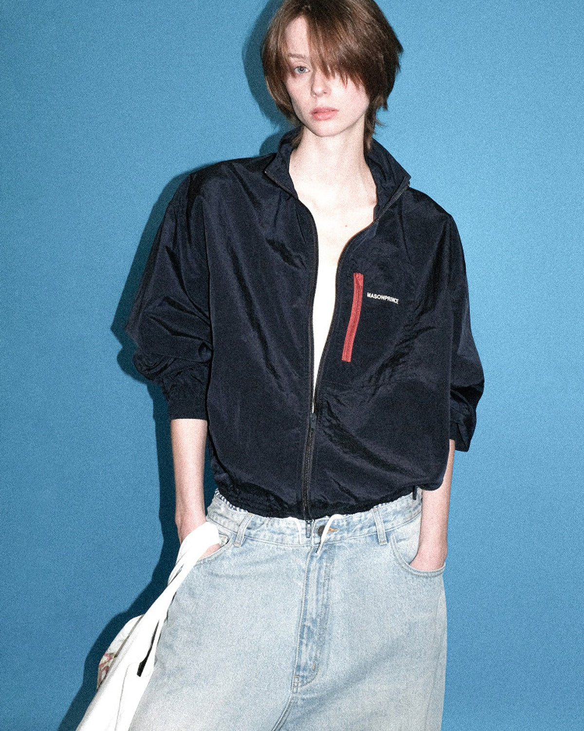 MASONPRINCE Lightweight Tonal Check Nylon Jacket in Navy Blue - On Female Model