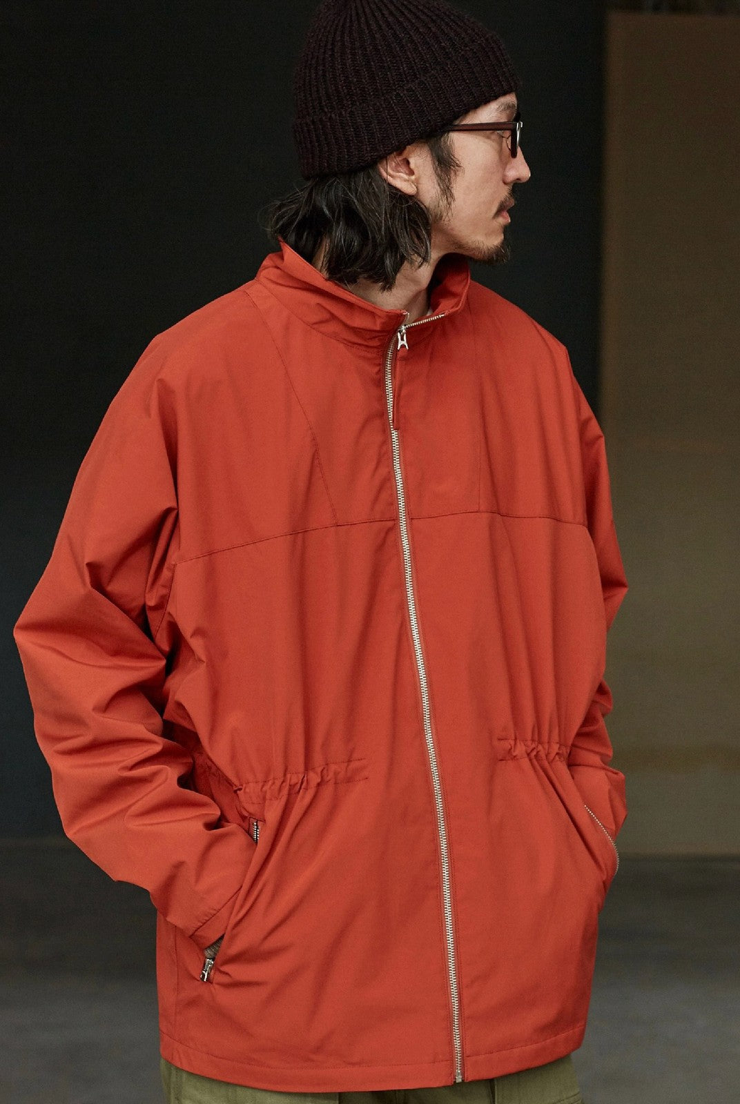 USAGE Drawstring Zip Front Tech Anorak in Orange - On Male Model