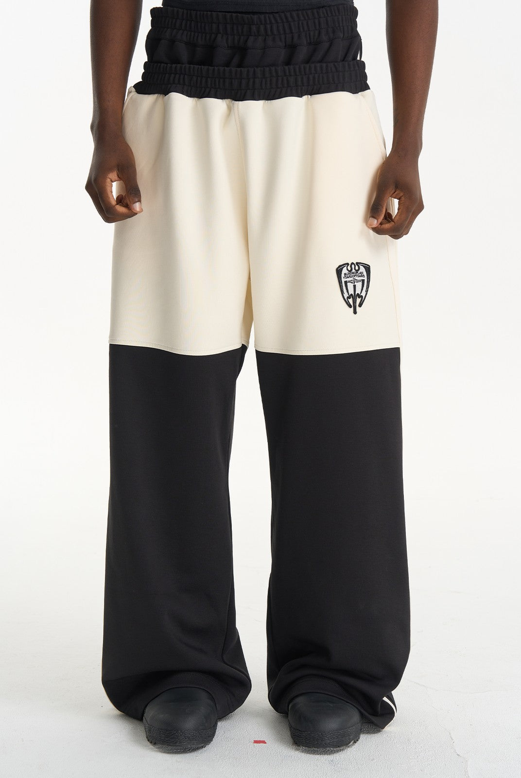 BLINDNOPLAN Color Block Wide Leg Sweatpants in Black - On Male Model