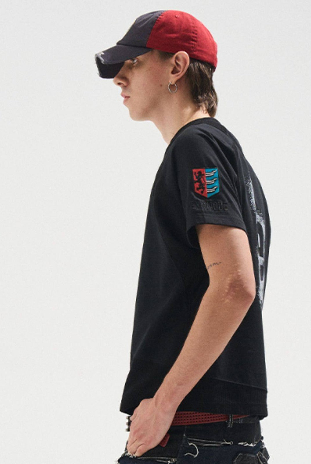 BLINDNOPLAN Sorona Panelled Graphic T Shirt in Black - On Male Model