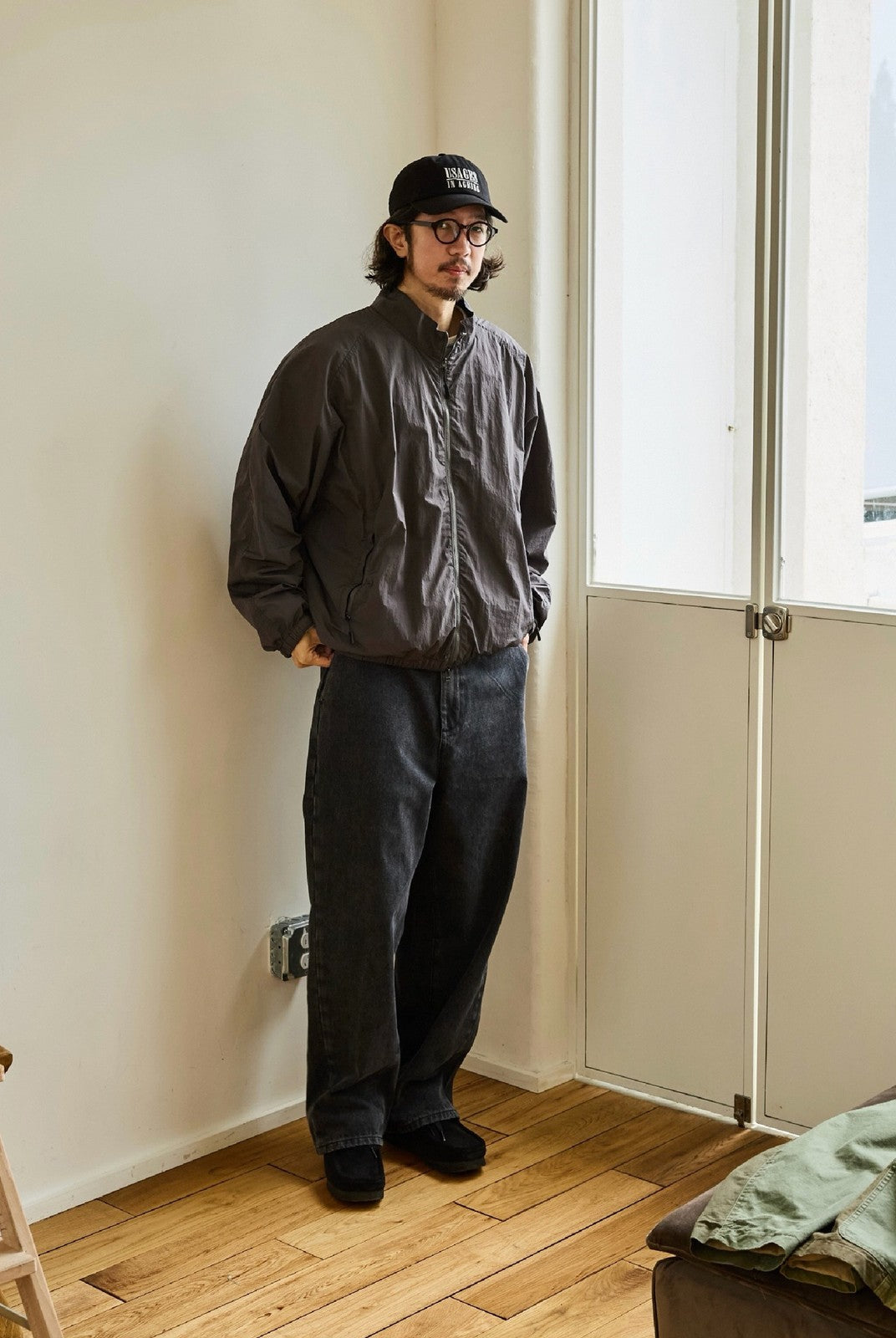 USAGE Lightweight Nylon Zip Up Jacket in Gray - On Male Model