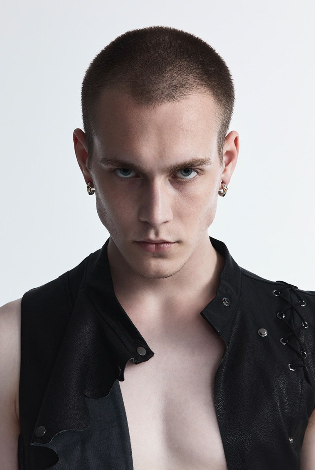 BLACKHEAD Two Tone Starburst Hoop Earrings in Gold - On Male Model