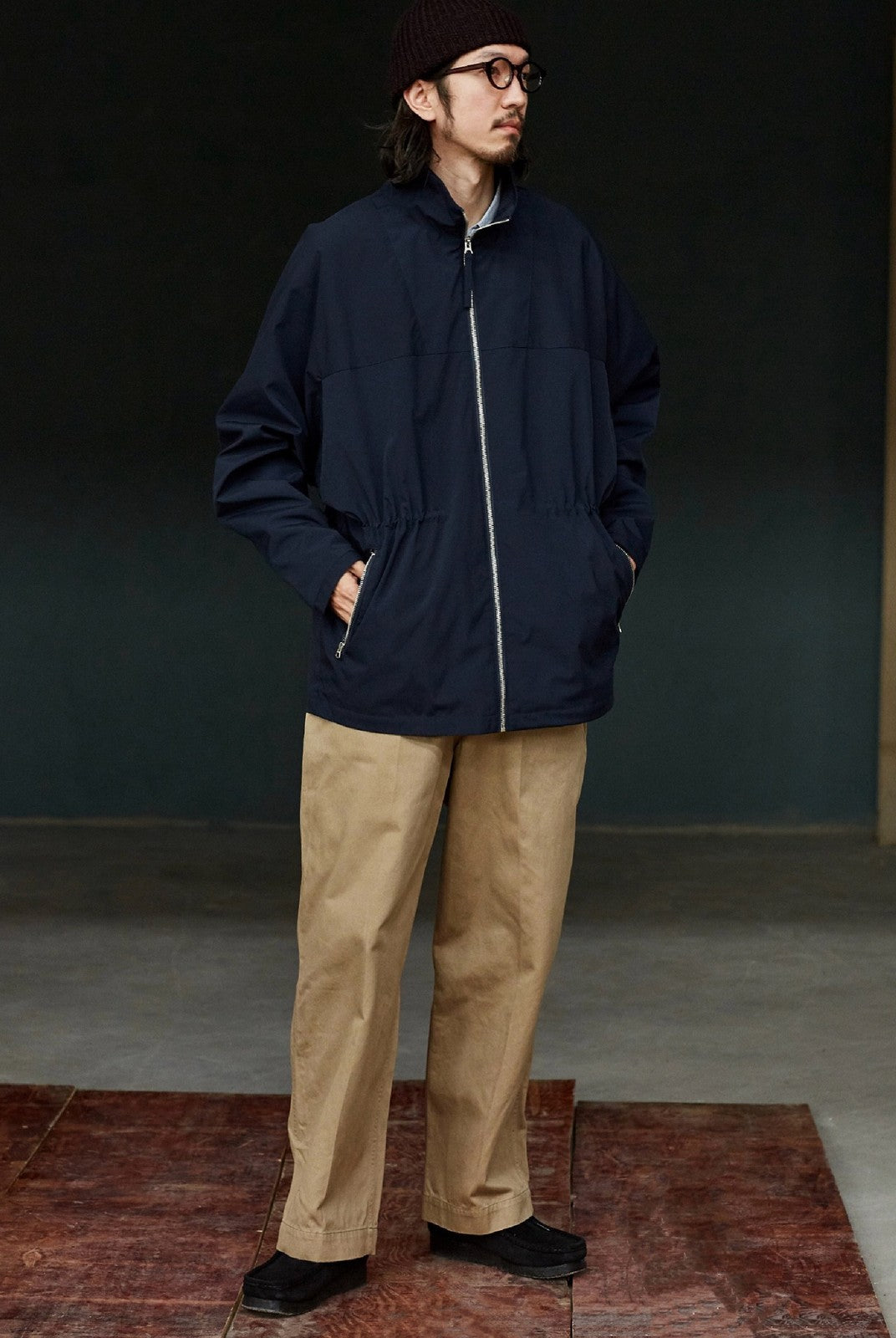 USAGE Drawstring Zip Front Tech Anorak in Navy Blue - On Male Model
