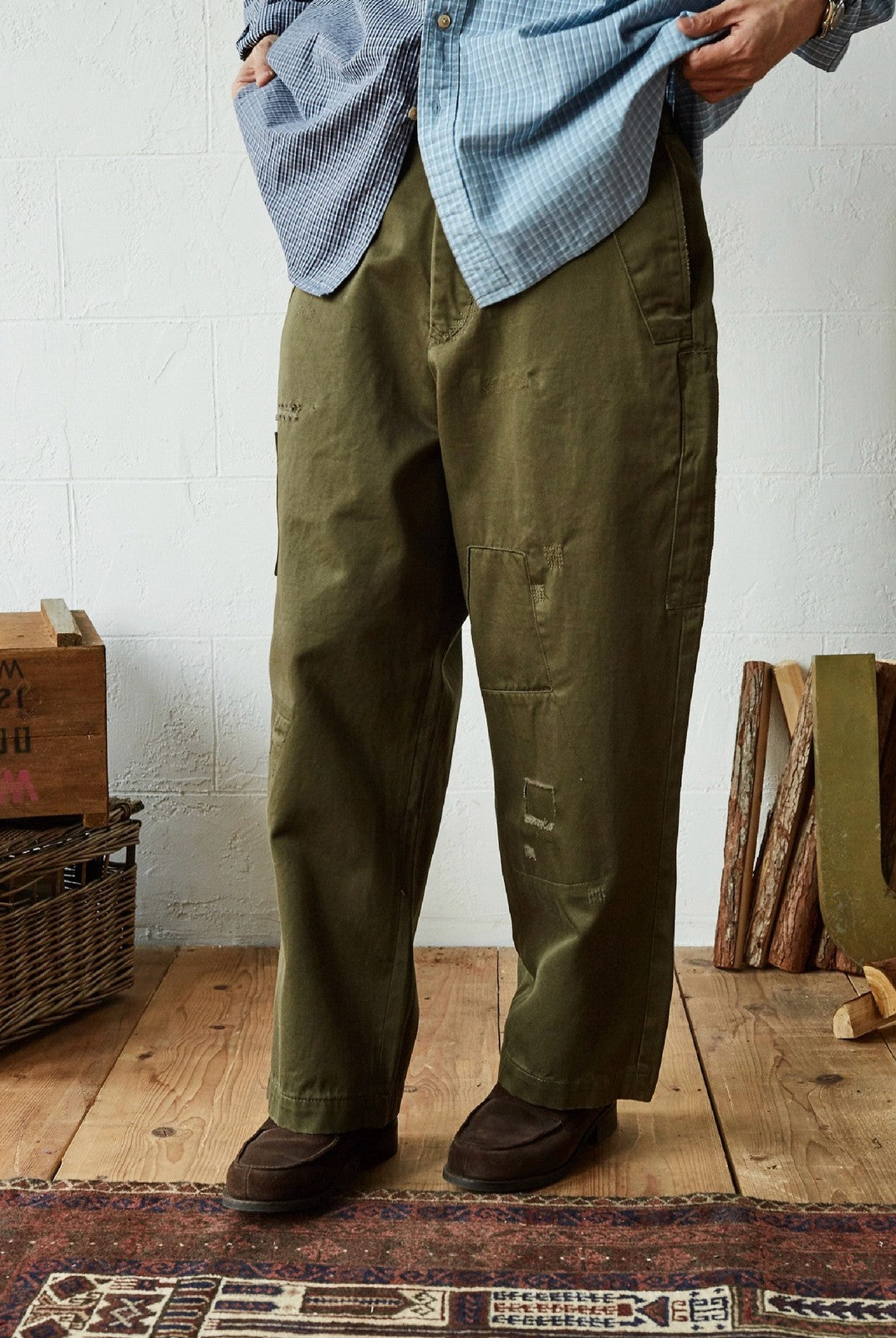 USAGE Hand Distressed Patched Chinos in Olive - On Male Model