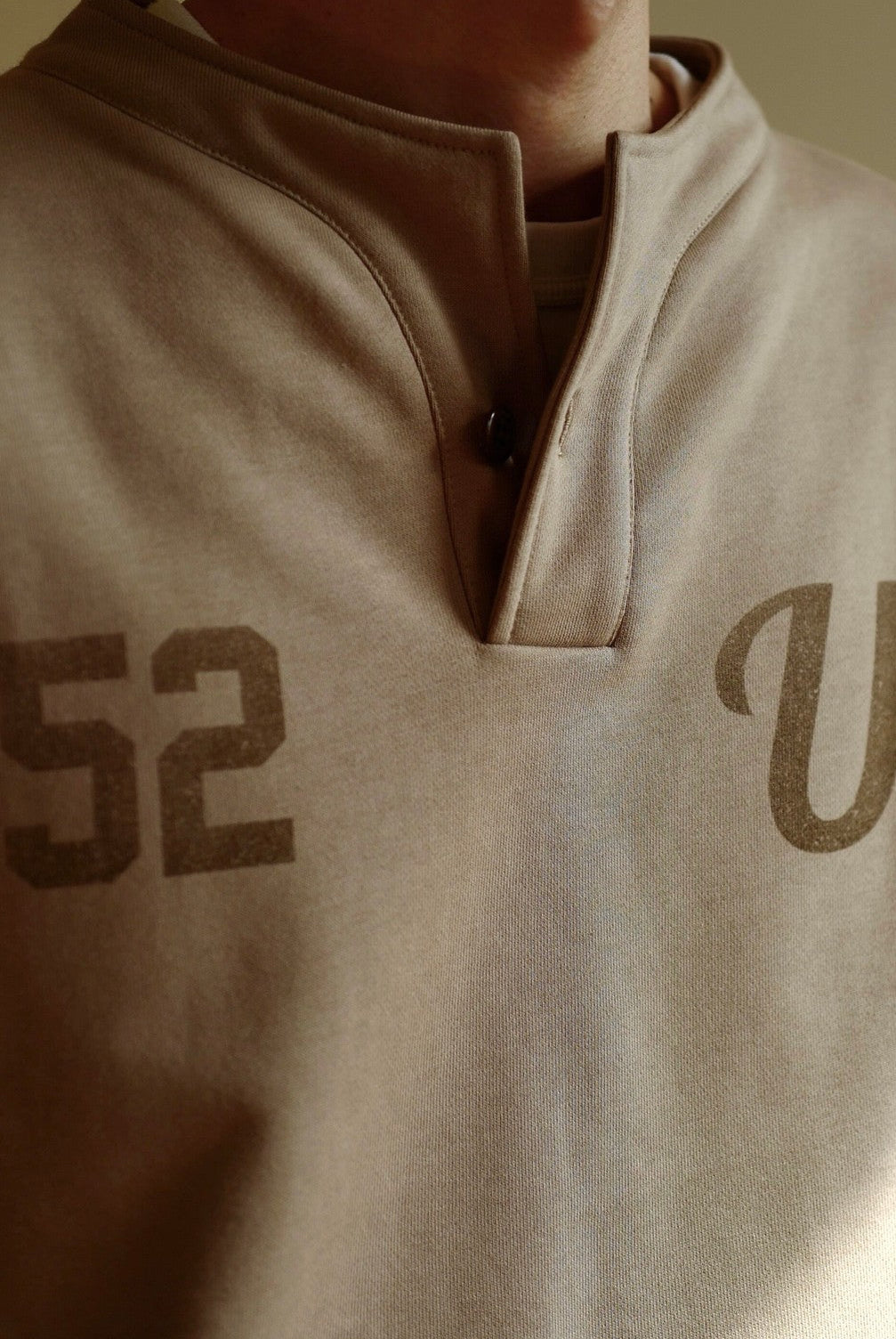 USAGE Terry Cotton Henley Sweatshirt in Beige - On Male Model