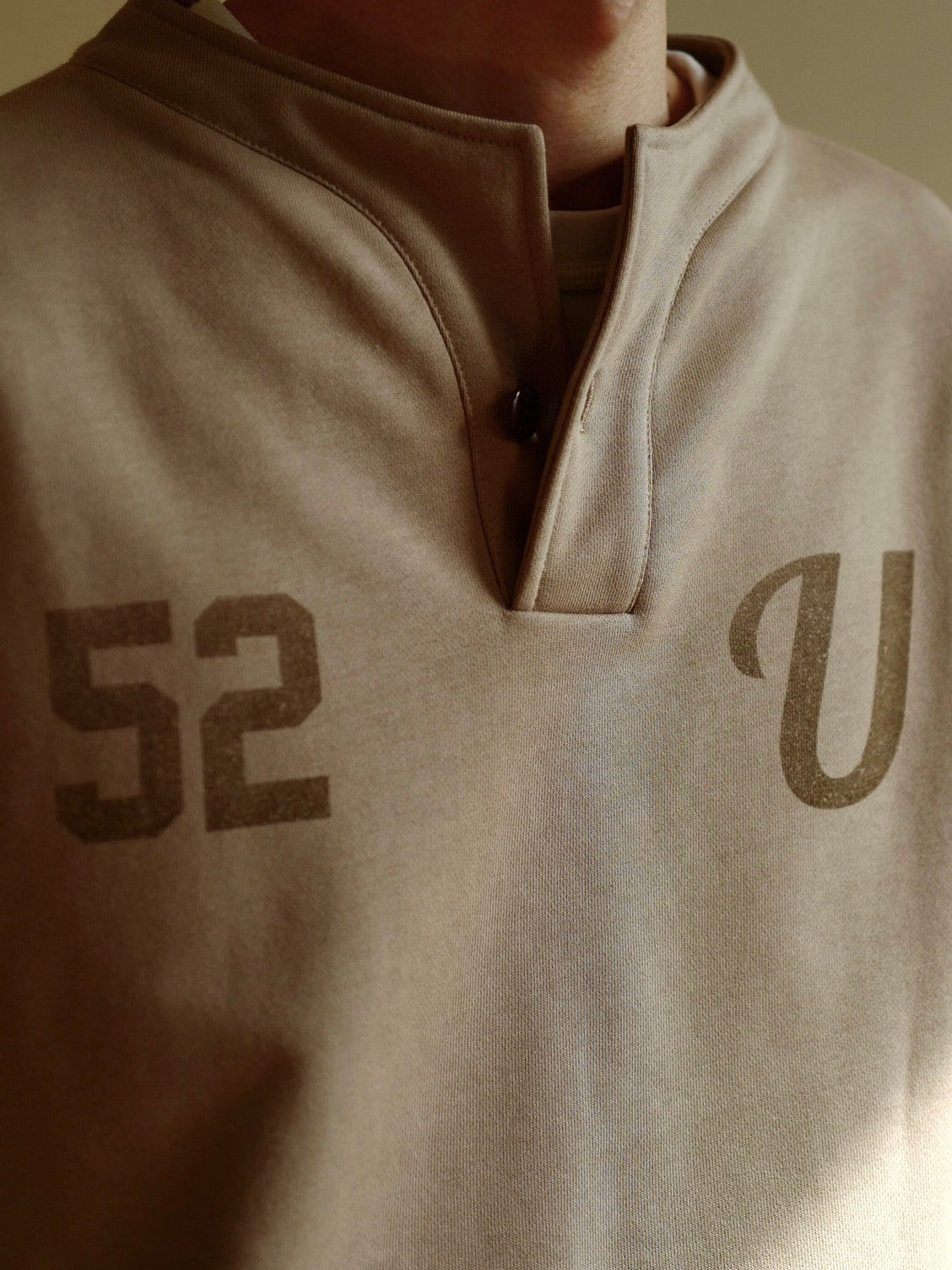 USAGE Terry Cotton Henley Sweatshirt in Beige - On Male Model