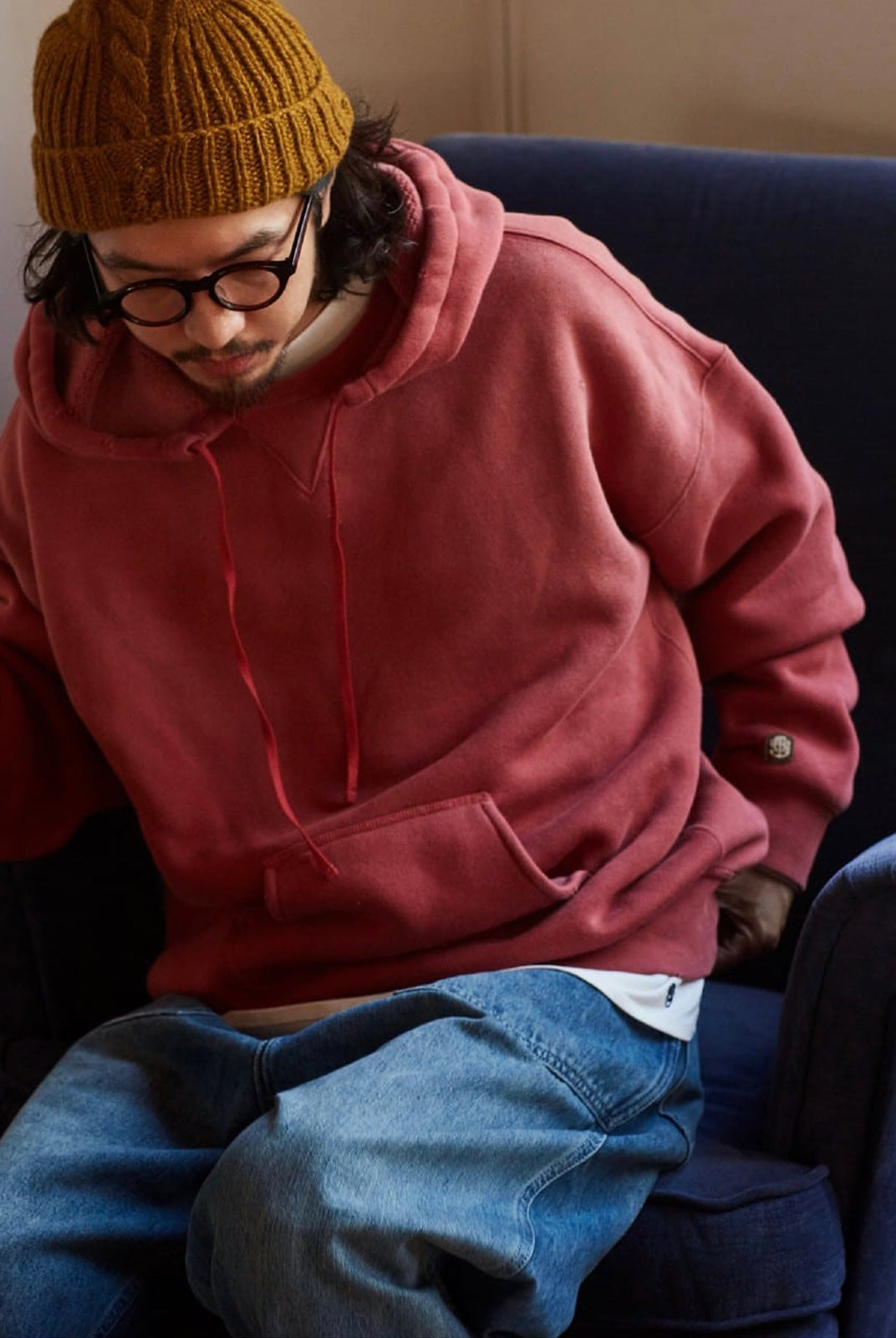 USAGE Faded Vintage Wash Hoodie in Red - On Male Model