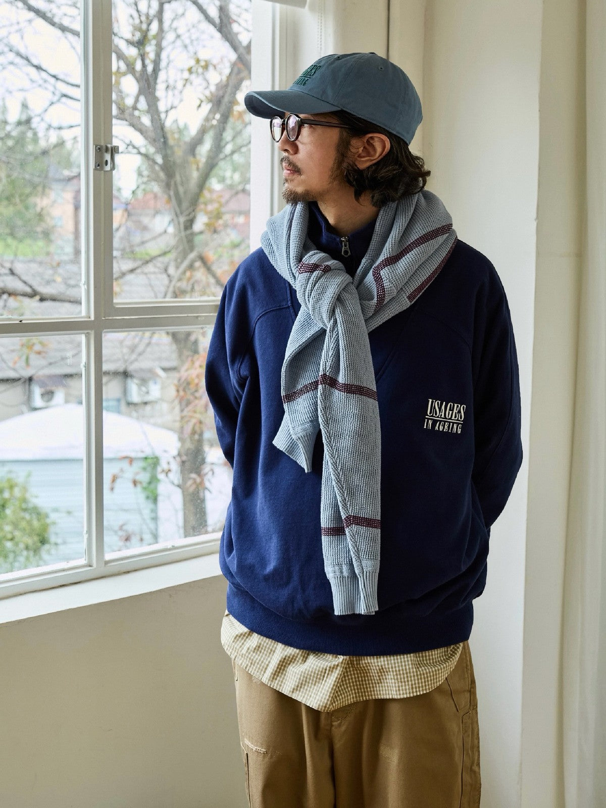 USAGE Heavyweight Cotton Half Zip Sweatshirt in Navy Blue - On Male Model